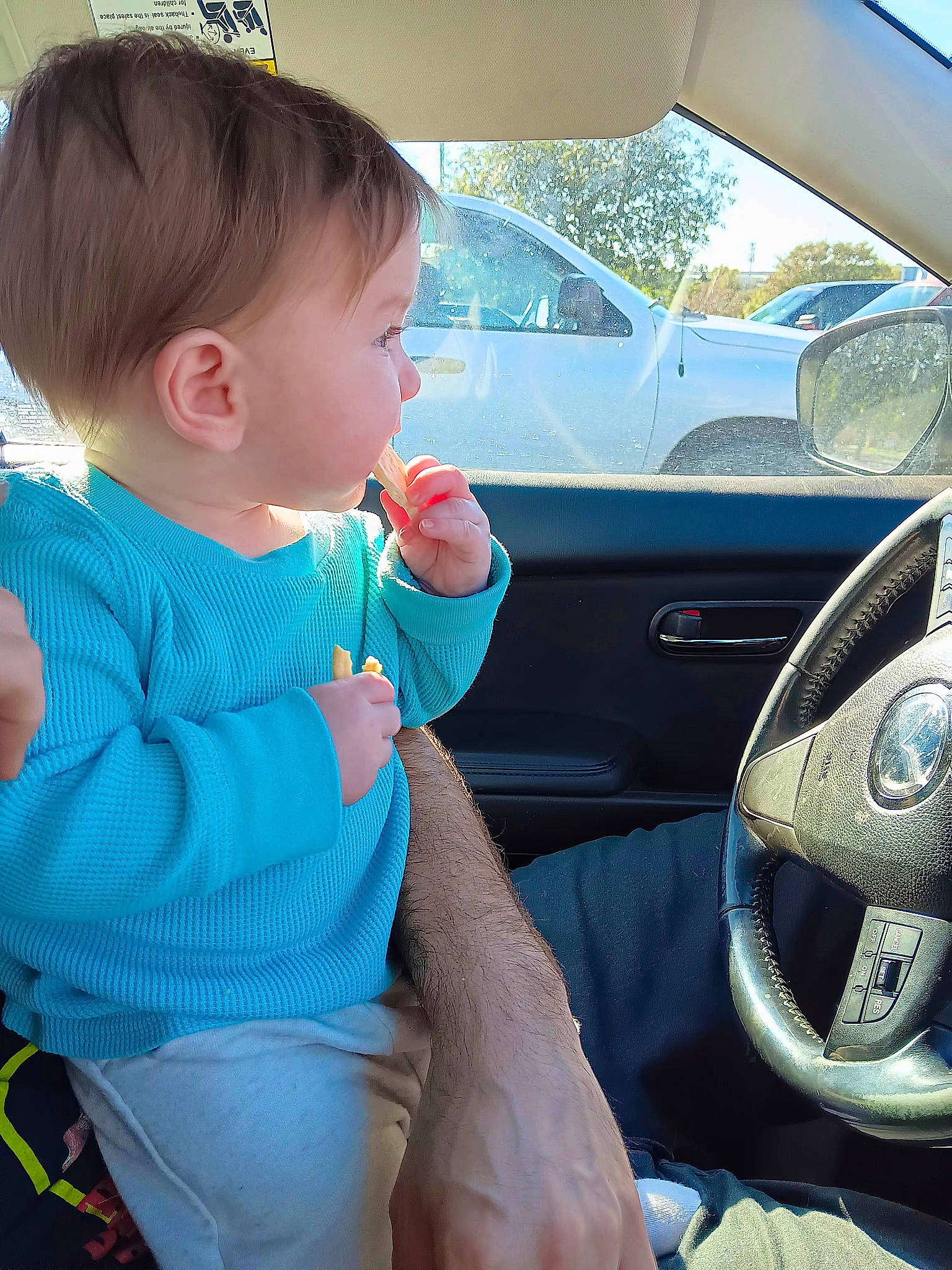 Sasha joined the competition — help win amazing prizes! auto_part, automotive_design, automotive_exterior, automotive_mirror, automotive_window_part, baby_toddler_clothing, car, car_seat, electric_blue, motor_vehicle, person, personal_luxury_car, product, rear_view_mirror, sky, steering_part, steering_wheel, toddler, vehicle, vehicle_door