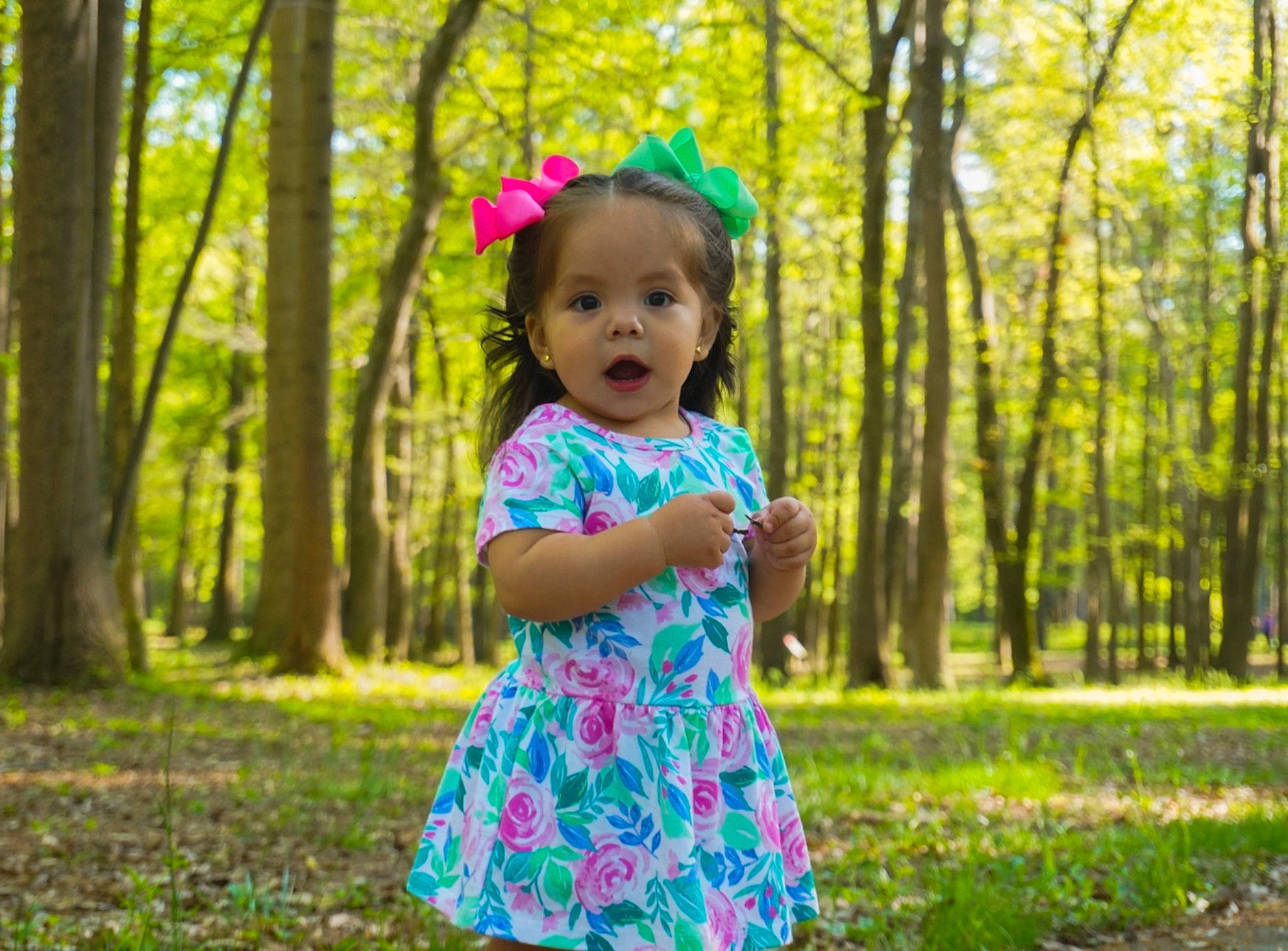 Zelah joined the competition — help win amazing prizes! baby, baby_toddler_clothing, dress, face, facial_expression, fun, grass, happy, headgear, leaf, leisure, meadow, outerwear, people_in_nature, person, plant, standing, sunlight, toddler, tree