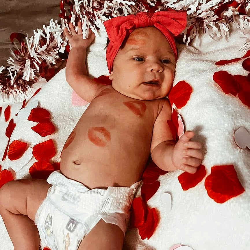 Oaklynn is registered to the contest to win money with this photo: baby, babylaughing, bathing, blanket, bodypart, clothing, diaper, face, finger, hand, happy, hat, head, newborn, person, photography, portrait, sitting, smile