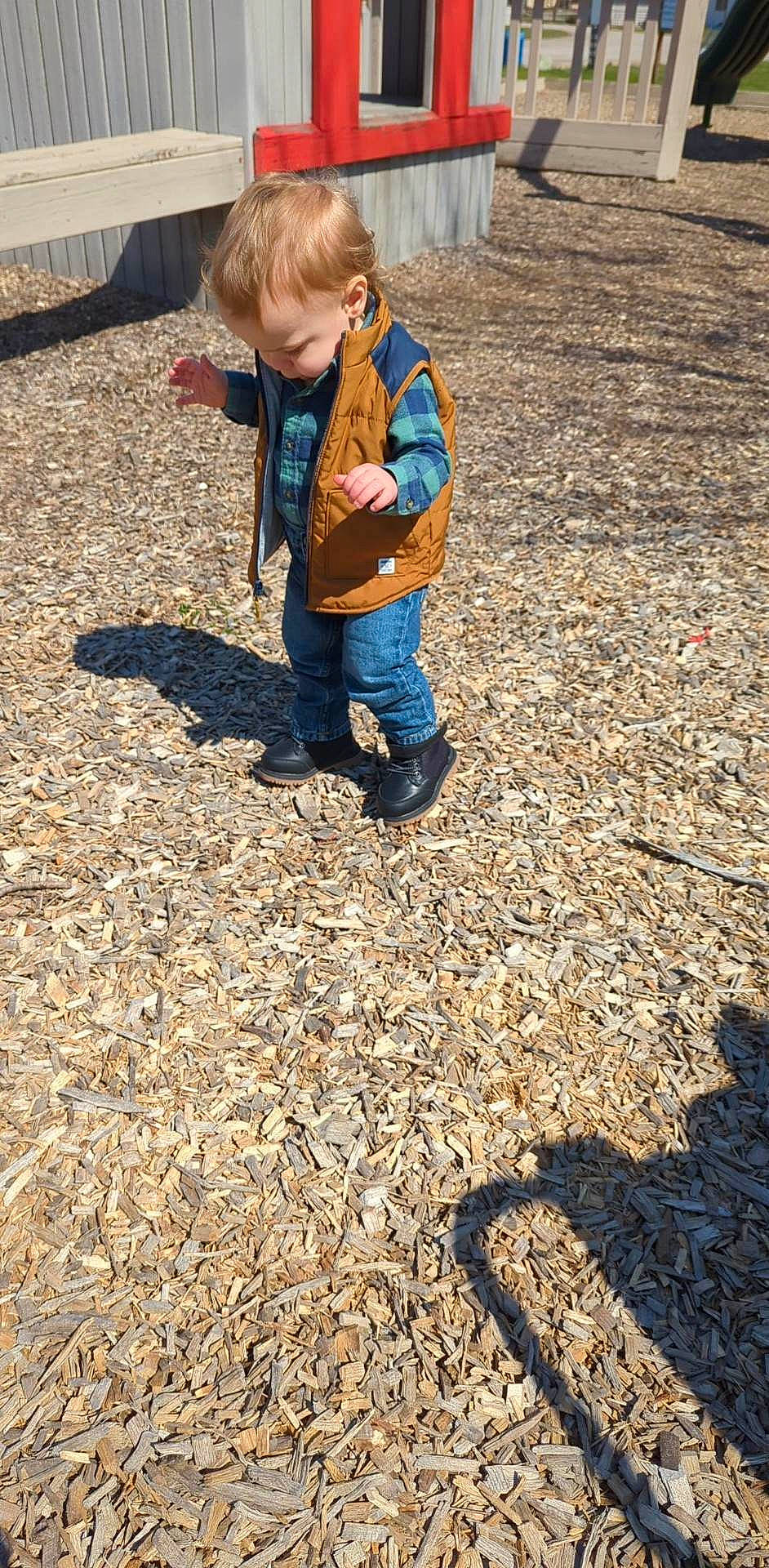 Atticus is registered to the contest to win money with this photo: asphalt, baby, baby_toddler_clothing, child, denim, flooring, fun, grass, jeans, landscape, people_in_nature, person, play, recreation, road_surface, sand, shadow, sitting, soil, toddler