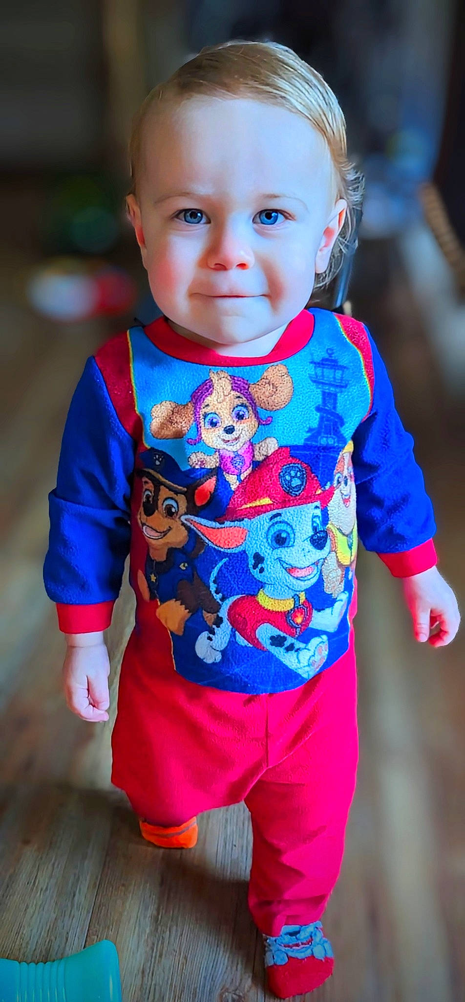 Atticus is registered to the contest to win money with this photo: arm, baby, baby_toddler_clothing, blue, child, cool, electric_blue, eye, face, fun, grass, happy, magenta, pattern, person, product, red, sleeve, t_shirt, toddler