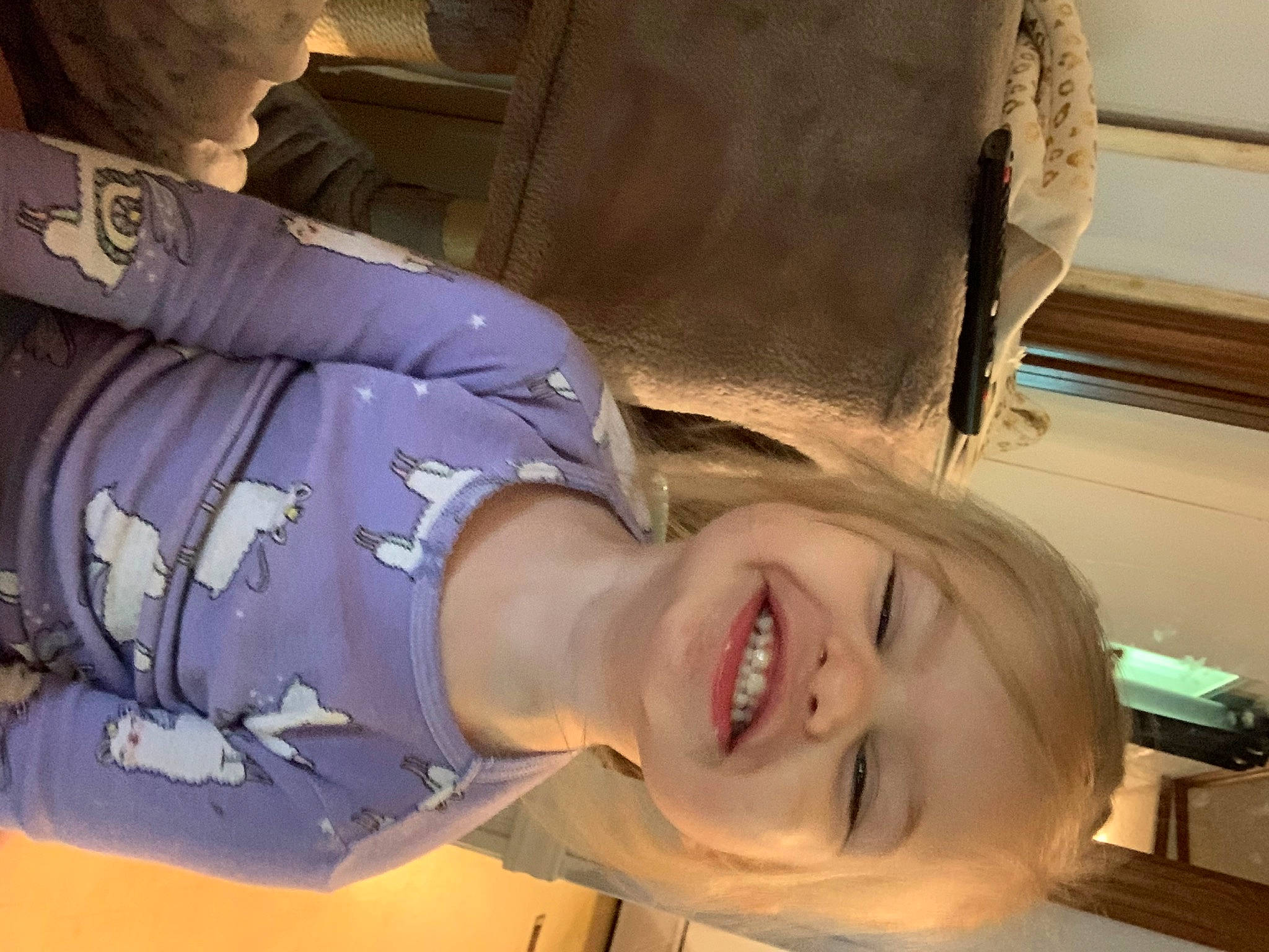 Lylah is registered to the contest to win money with this photo: child, eyewear, fun, happy, hat, helmet, joy, laugh, person, personal_protective_equipment, room, smile, toddler, uniform