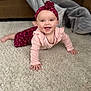Aphelia Kay joined the competition — help win amazing prizes! baby, child, crawling, smiling, headband, flower, pink_clothing, carpet, indoor, blanket, couch, happy, cute, person, infant, hands, face, eyes, mouth, cozy
