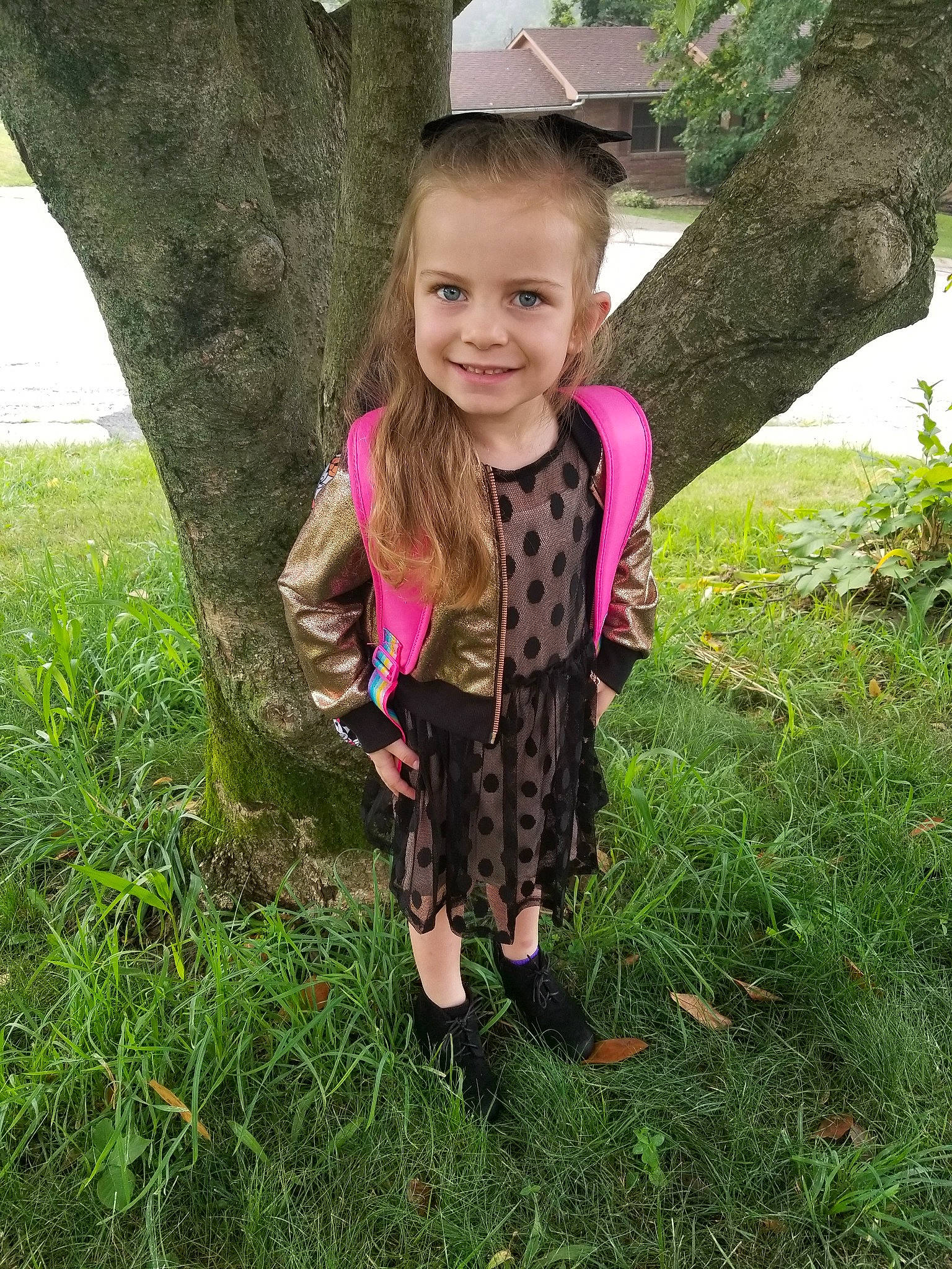 Arwen is registered to the contest to win money with this photo: botany, child, child_model, design, face, flower, grass, joy, leaf, leggings, outerwear, pattern, person, pink, plant, play, product, sleeve, smile, spring