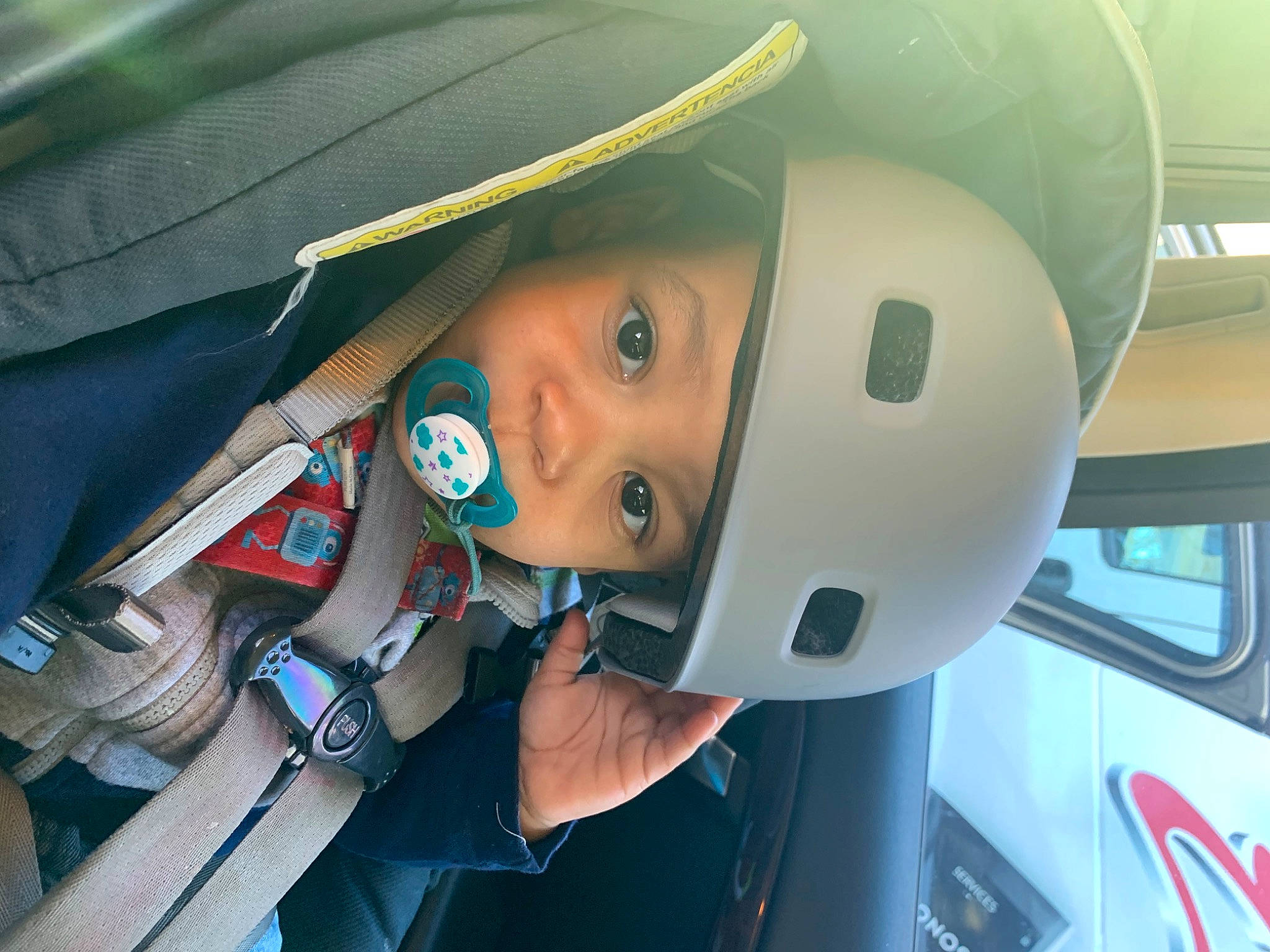 Korbyn joined the competition — help win amazing prizes! aircraft, auto_part, automotive_design, automotive_exterior, automotive_lighting, automotive_window_part, child, electric_blue, family_car, fashion_accessory, fun, headwear, helmet, motor_vehicle, nose, person, personal_protective_equipment, toddler, vacation, vehicle