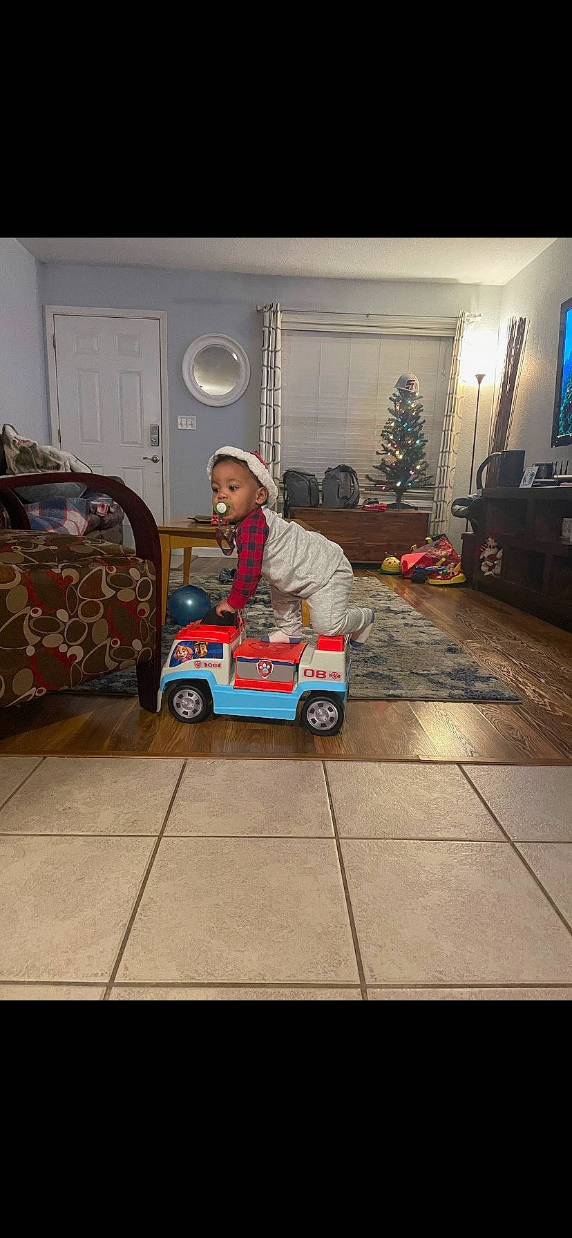 Korbyn joined the competition — help win amazing prizes! automotive_design, automotive_exterior, automotive_lighting, automotive_tire, automotive_wheel_system, car, floor, flooring, fun, motor_vehicle, person, riding_toy, room, television, tire, toddler, toy, vehicle, vehicle_door, wheel