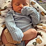 Carter joined the competition — help win amazing prizes! baby, newborn, sleeping, blanket, animal_print, onesie, sock, infant, cozy, cute, peaceful, child, indoor, soft, resting, furniture, carpet, person, portrait, toddler