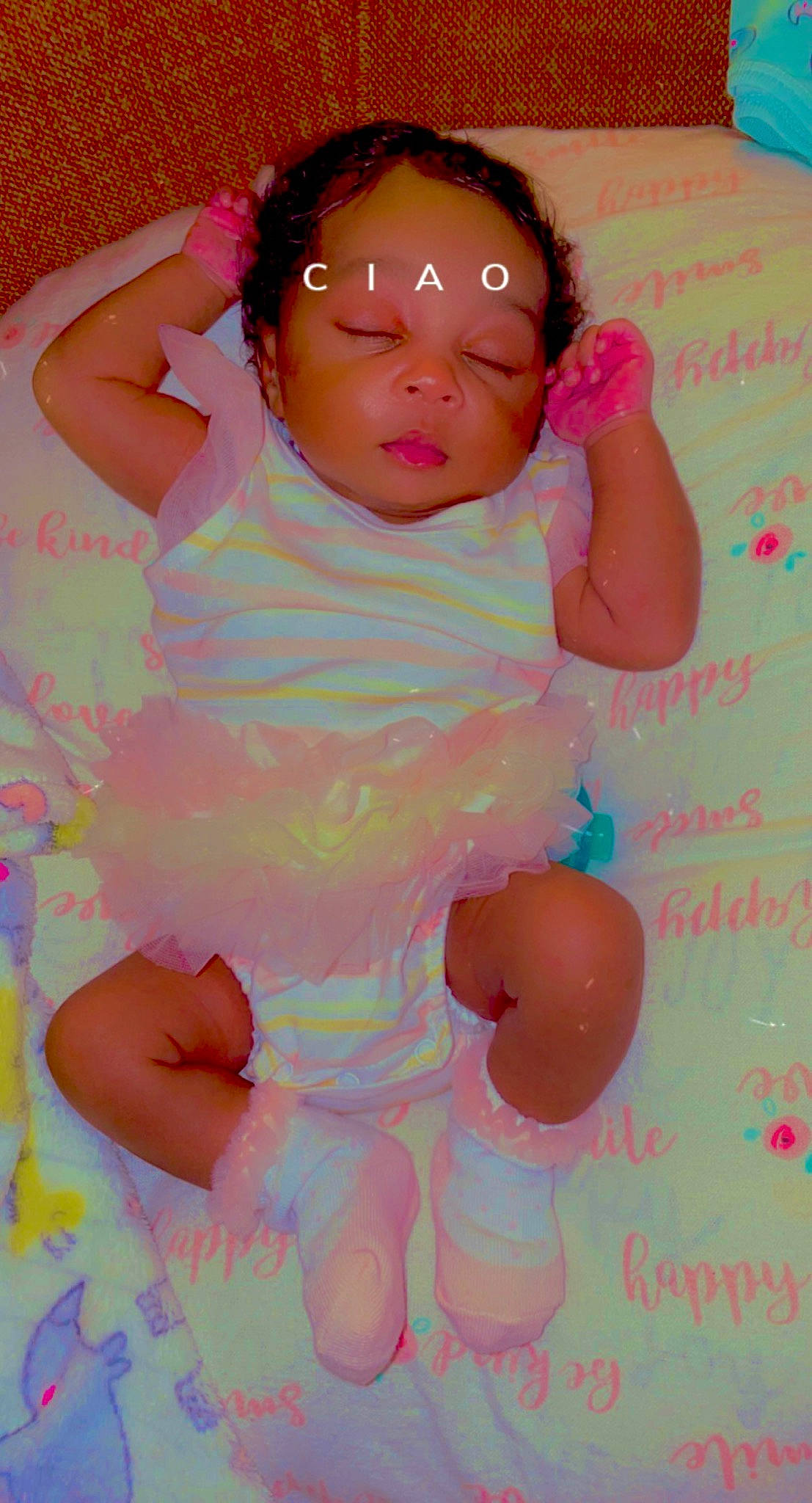 Lauryn is registered to the contest to win money with this photo: arm, baby, baby_toddler_clothing, cheek, face, facial_expression, finger, hand, happy, head, mouth, muscle, neck, nose, person, pink, purple, skin, stomach, textile