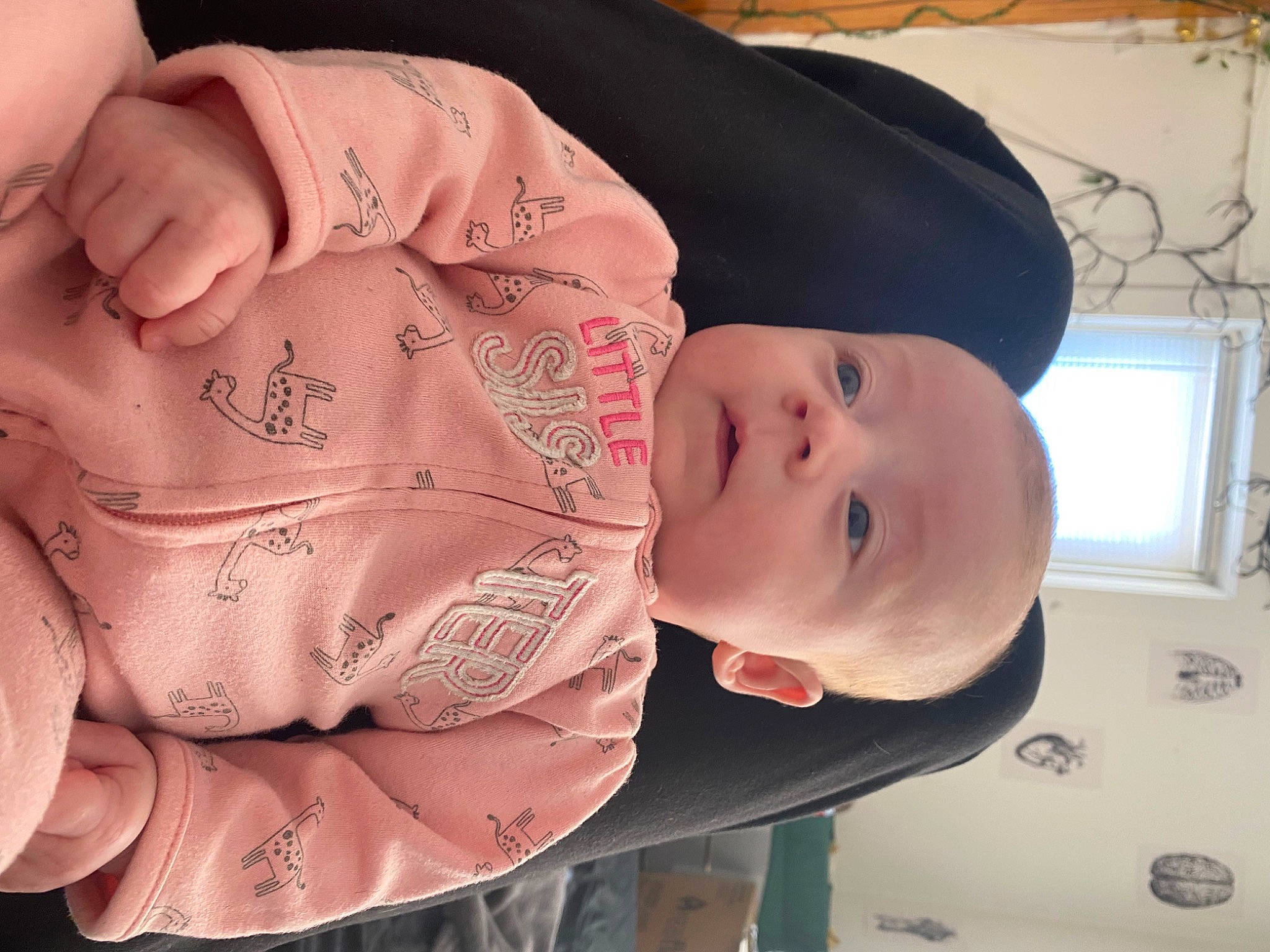 Dahlia joined the competition — help win amazing prizes! baby, baby_toddler_clothing, cheek, child, comfort, face, finger, gesture, headgear, human_body, mouth, nail, nose, person, product, skin, sleeve, smile, stomach, thumb