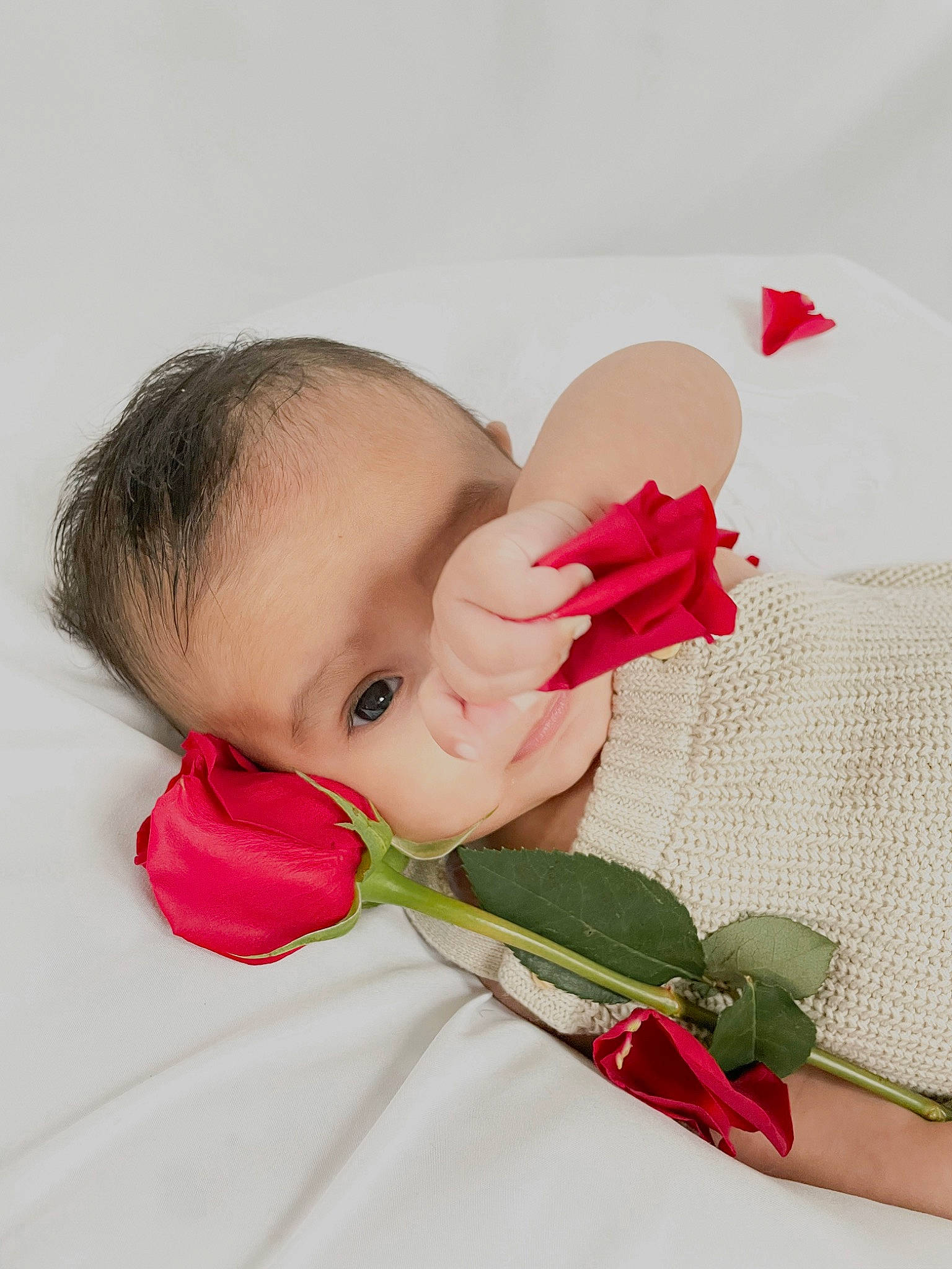 Alexander is registered to the contest to win money with this photo: baby, baby_toddler_clothing, blossom, carmine, cheek, child, collar, comfort, drinkware, eyelash, fashion_accessory, gesture, happy, linens, lip, nail, neck, person, petal, sleeve