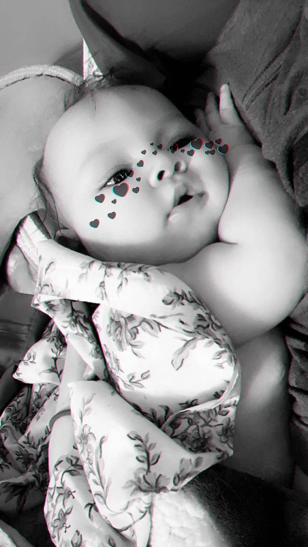 Violet joined the competition — help win amazing prizes! arm, baby, black_and_white, chest, child, flash_photography, flesh, happy, human_body, linens, monochrome, monochrome_photography, pattern, person, petal, portrait_photography, sitting, still_life_photography, style, toy