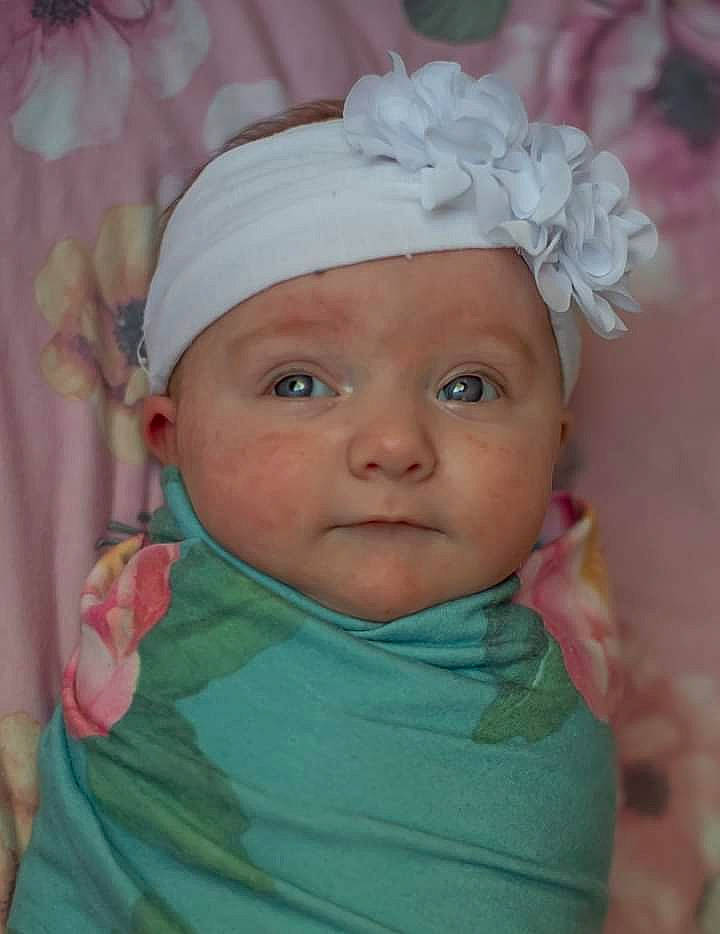 Carolina is registered to the contest to win money with this photo: baby, baby_toddler_clothing, bonnet, cheek, child, chin, costume_accessory, hair_accessory, headband, headgear, headpiece, headwear, iris, lip, mouth, nose, peach, person, pink, portrait_photography