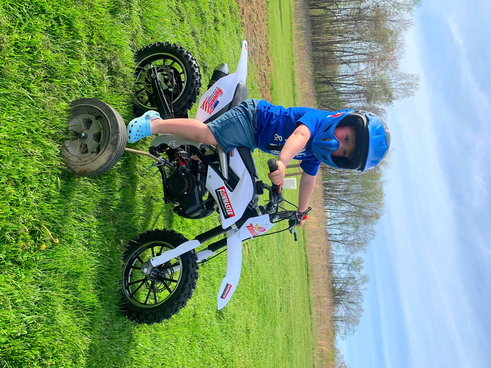 Carter joined the competition — help win amazing prizes! automotive_tire, bicycle, bicycle_clothing, bicycle_fork, bicycle_frame, bicycle_handlebar, bicycle_helmet, bicycle_tire, bicycle_wheel, bicycles_equipment_and_supplies, footwear, headwear, helmet, land_vehicle, person, plant, sky, sports_equipment, tire, tree