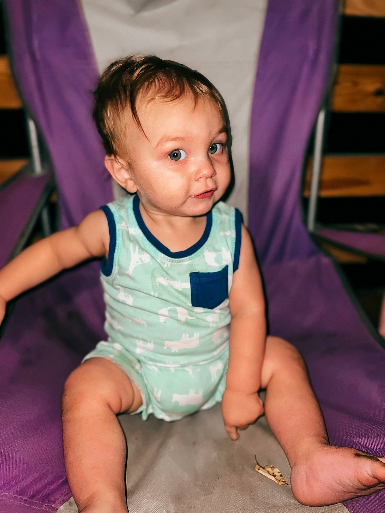 Kamden is registered to the contest to win money with this photo: baby, baby_toddler_clothing, cheek, eye, finger, flash_photography, happy, head, human_body, iris, joint, person, pink, purple, shoulder, skin, sleeve, smile, standing, textile