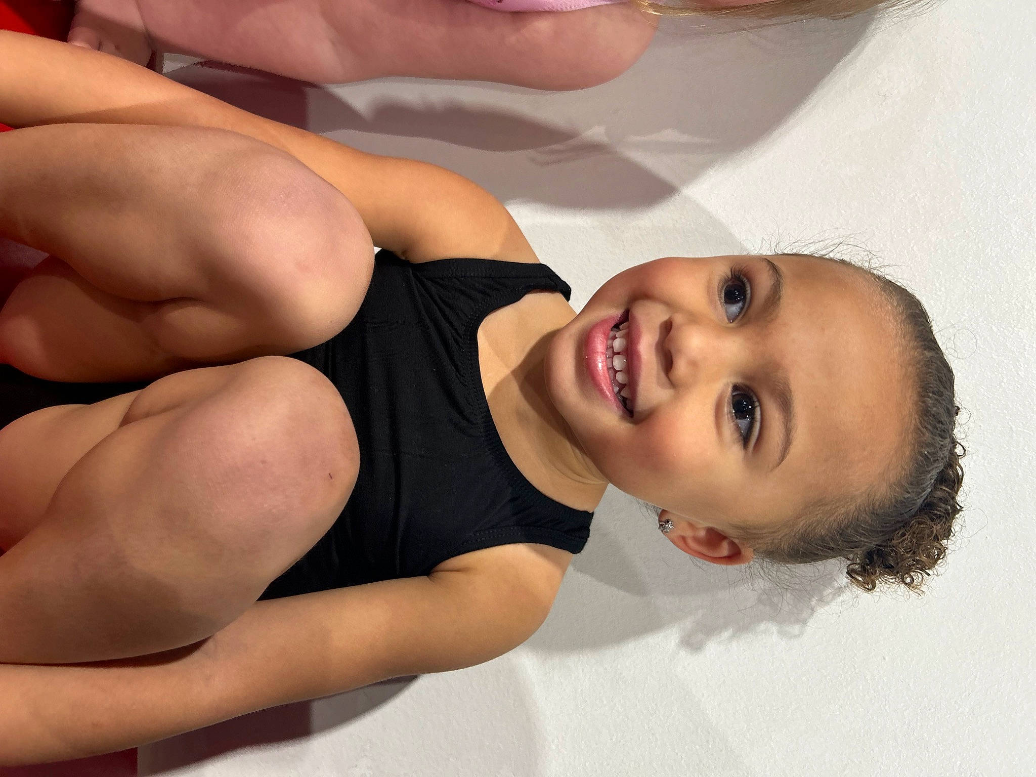 Keeley is registered to the contest to win money with this photo: chest, chin, elbow, eye, eyelash, face, facial_expression, gesture, hair, happy, head, human_body, joint, joy, leg, lip, mouth, muscle, person, skin