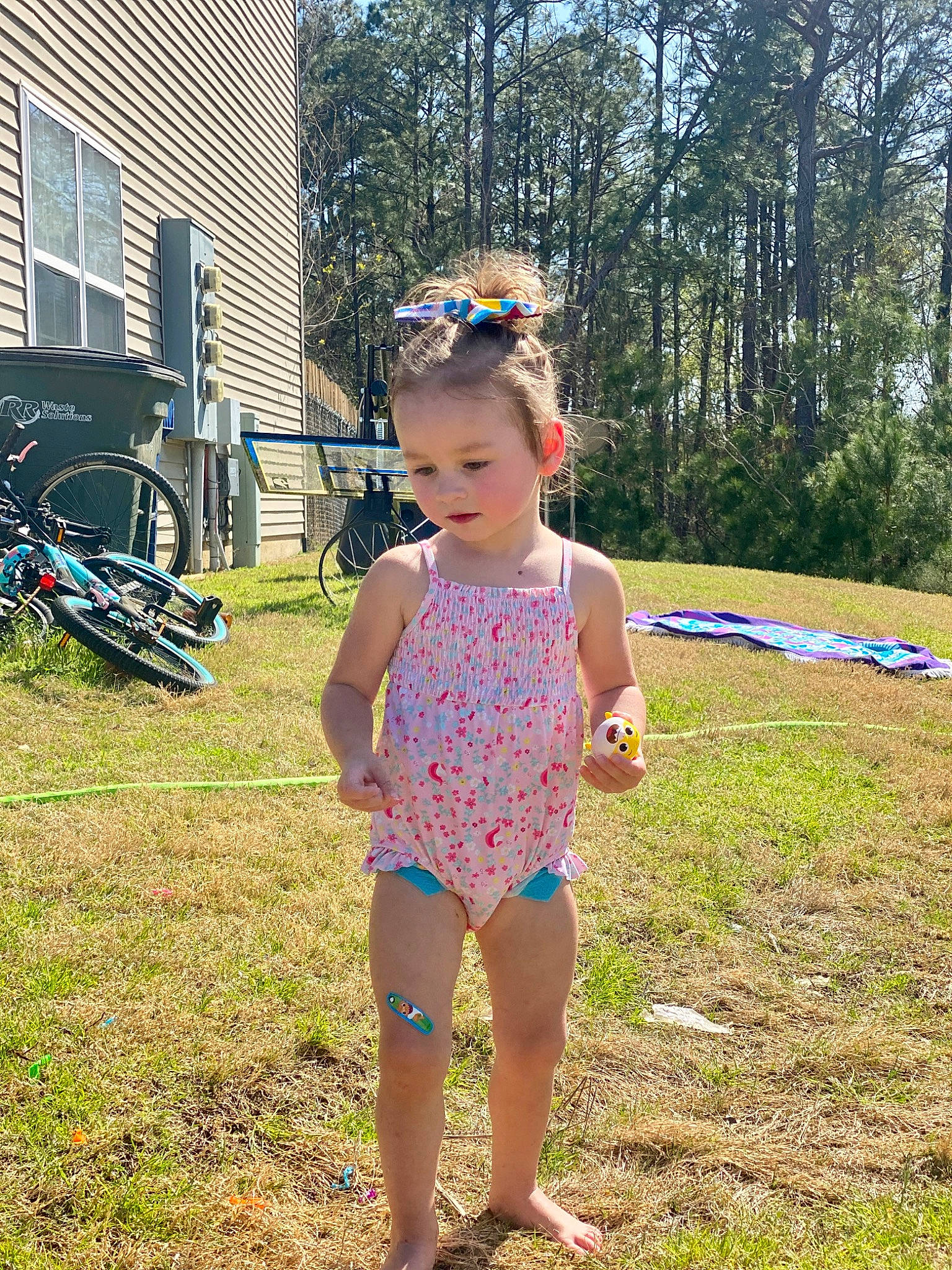 Kaysley joined the competition — help win amazing prizes! bicycle_wheel, electric_blue, fun, grass, happy, headgear, leisure, meadow, people_in_nature, person, plant, recreation, spring, summer, swimwear, tire, toddler, tree, waist, wheel