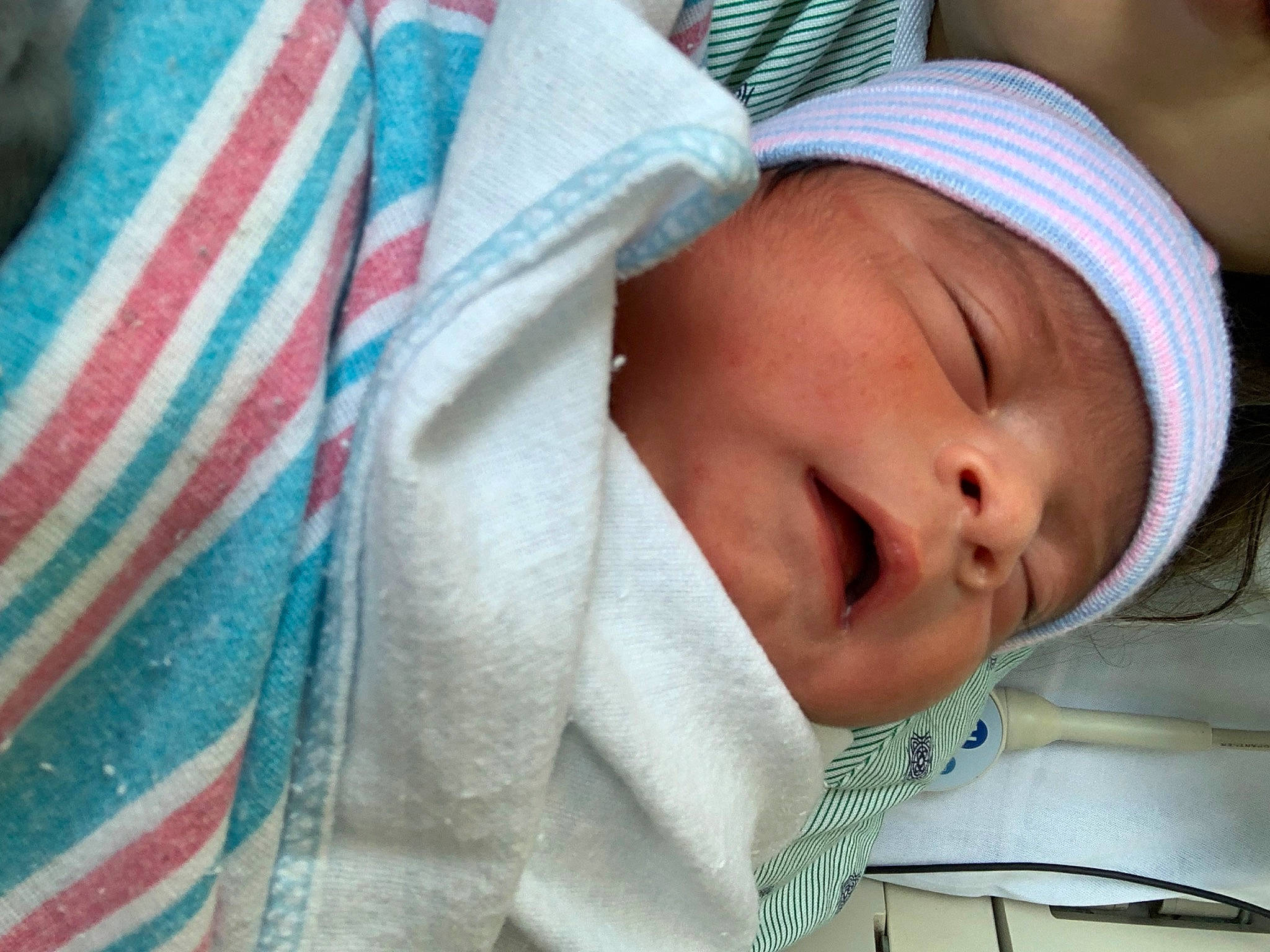 Adriel is registered to the contest to win money with this photo: baby, baby_products, baby_sleeping, bedtime, blanket, cap, child, childbirth, comfort, hat, headwear, linens, nap, person, room, skin, sleep, toddler, wrinkle