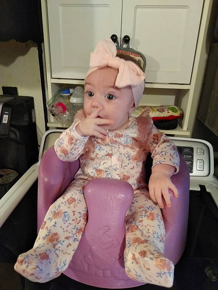 Kadence joined the competition — help win amazing prizes! baby, baby_toddler_clothing, cheek, child, comfort, costume, dress, fun, happy, head, human_body, human_leg, jewellery, lap, person, picture_frame, pink, room, sitting, television