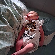 Connie Sage joined the competition — help win amazing prizes! baby, newborn, sleeping, onesie, infant, bed, blanket, pillow, pattern, soft_light, peaceful, cute, clothing, rest, child, human, skin, small, indoors, lying_down