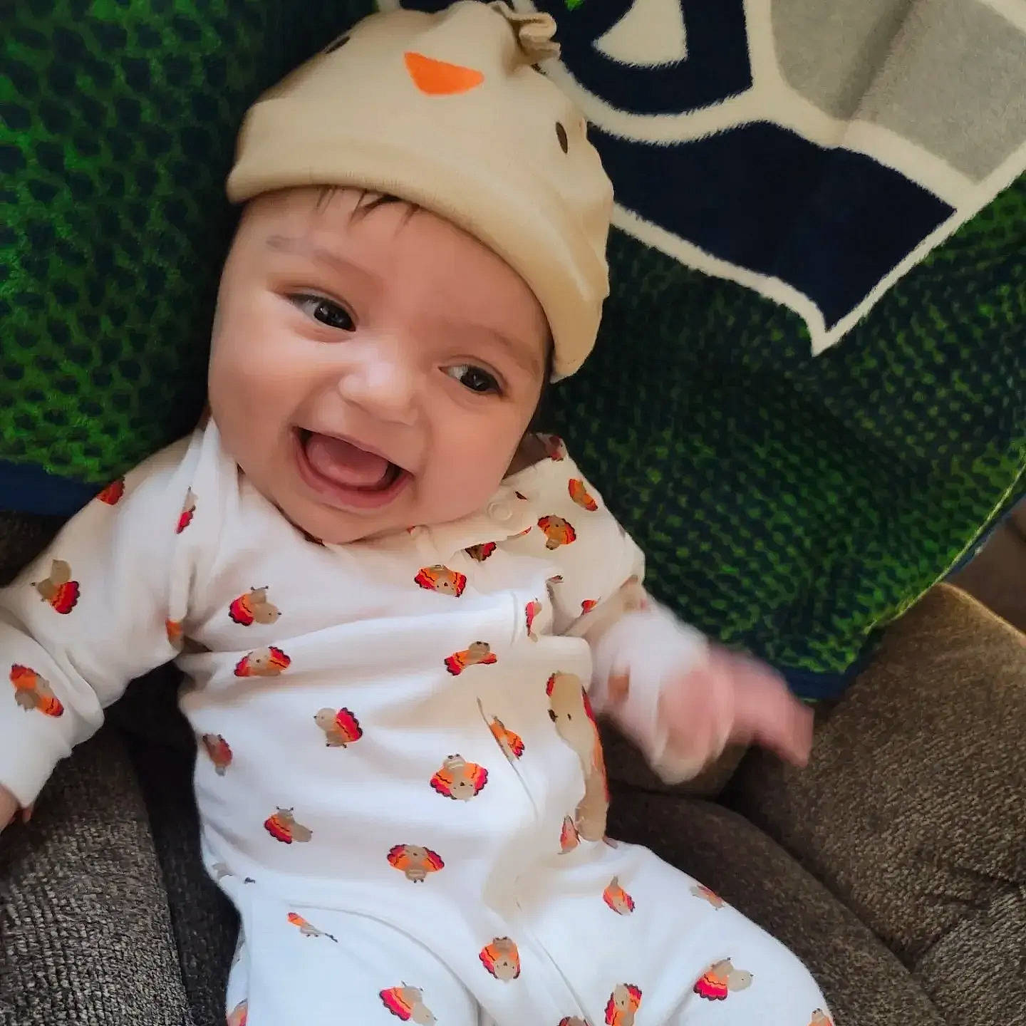 Zara joined the competition — help win amazing prizes! baby, baby_toddler_clothing, baseball_cap, cap, carmine, child, costume_hat, face, fashion_accessory, finger, happy, head, headwear, linens, outerwear, pattern, person, sleeve, smile, t_shirt