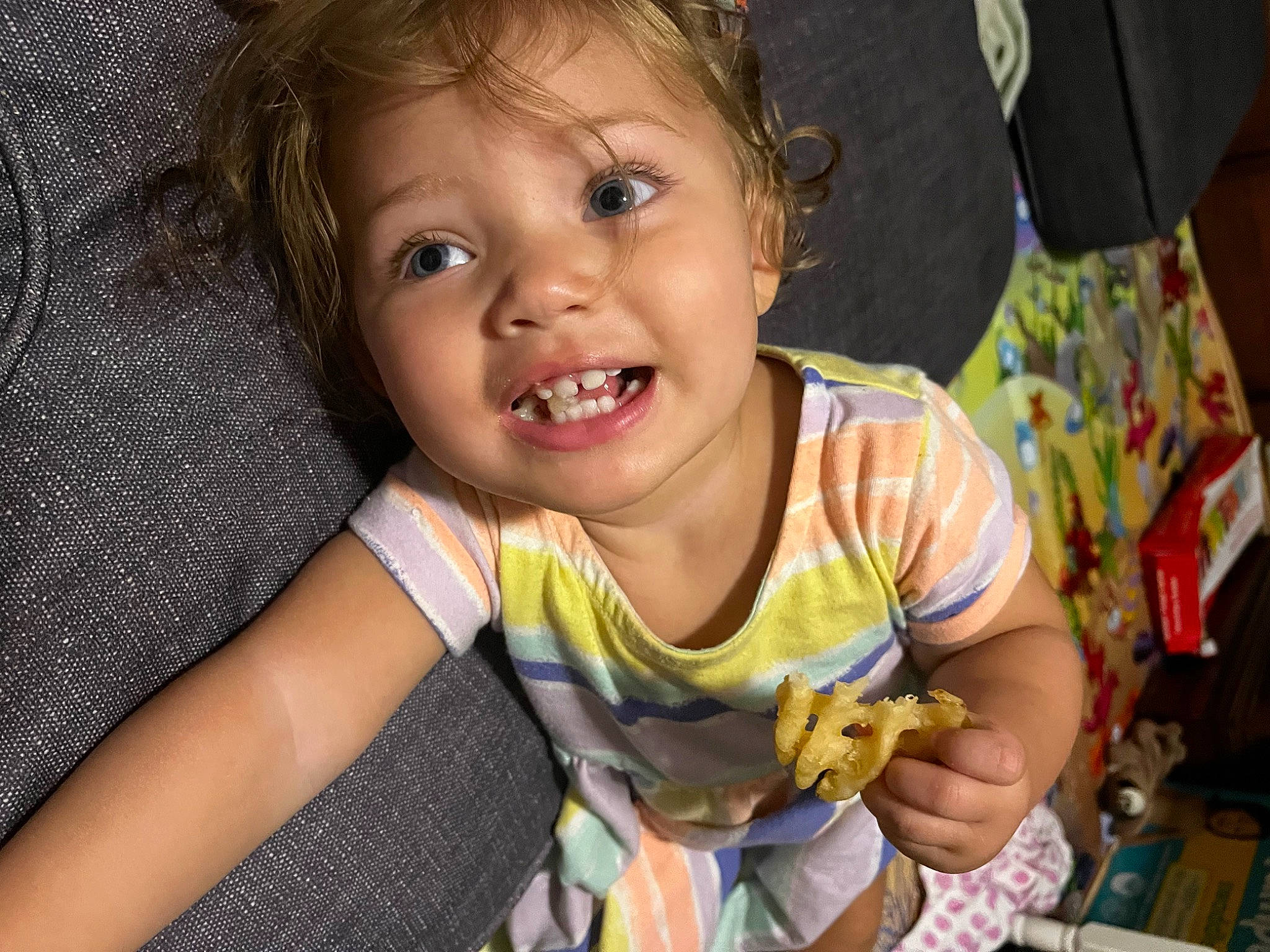 Liliana is registered to the contest to win money with this photo: baby, baby_toddler_clothing, cheek, child, eyelash, fun, hairstyle, happy, human, iris, laugh, lip, nose, person, portrait_photography, sitting, skin, smile, t_shirt, thumb