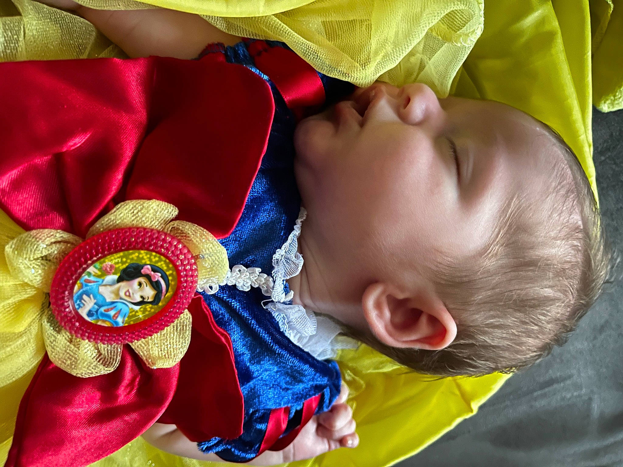 Nadia joined the competition — help win amazing prizes! baby, baby_products, baby_toddler_clothing, child, electric_blue, event, fashion_accessory, fictional_character, flag, fun, happy, headgear, magenta, pattern, person, petal, product, red, tie, toddler