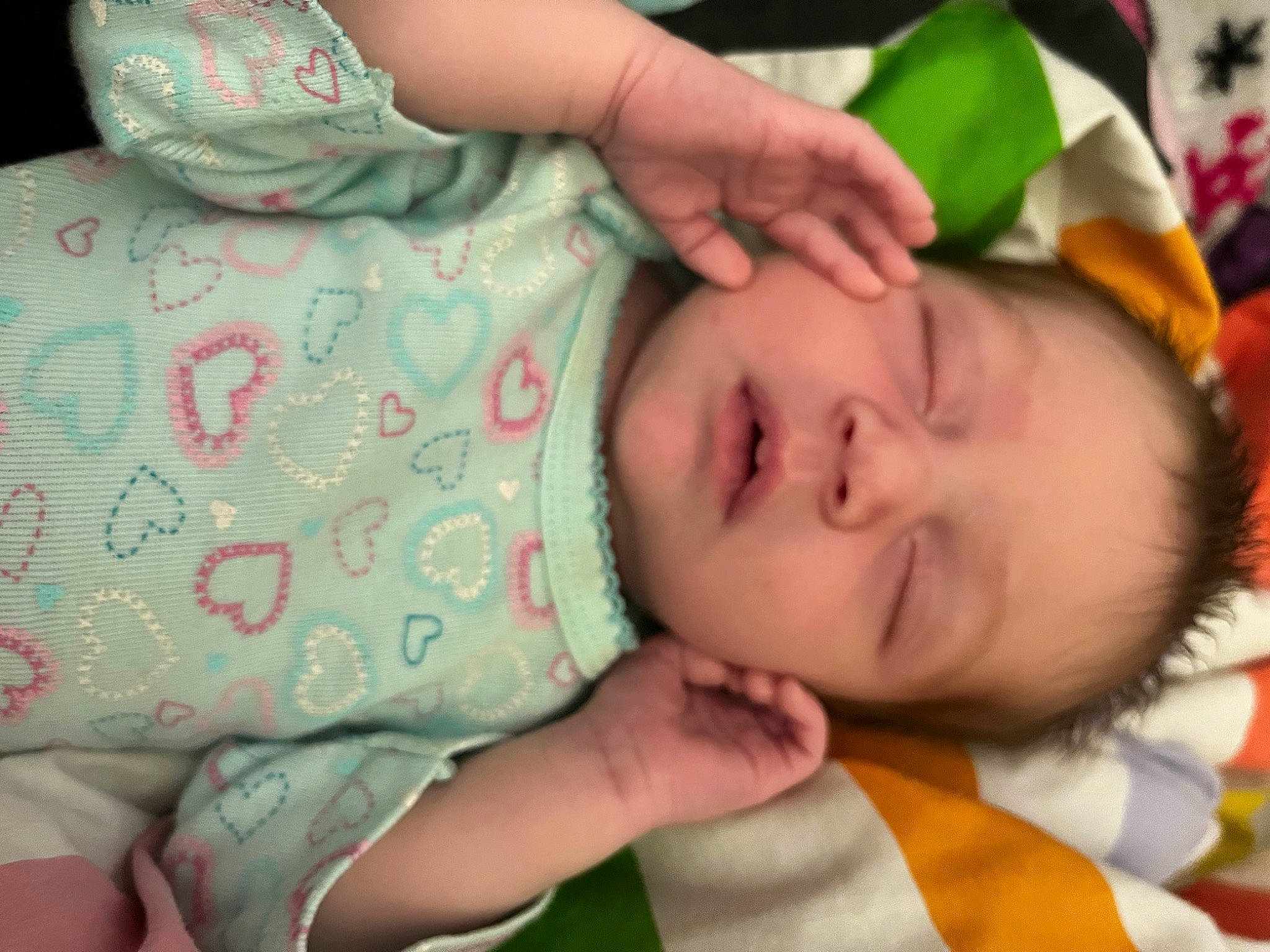 Nadia joined the competition — help win amazing prizes! baby, baby_toddler_clothing, cheek, eye, eyelash, face, facial_expression, finger, green, head, human_body, lip, mammal, mouth, nose, organ, person, pink, skin, sleeve