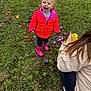Peyton is registered to the contest to win money with this photo: child, toddler, outdoor, grass, easter_eggs, colorful, jacket, pink_boots, happy, smiling, person, adult, basket, play, spring, nature, fun, celebration, holiday, excited
