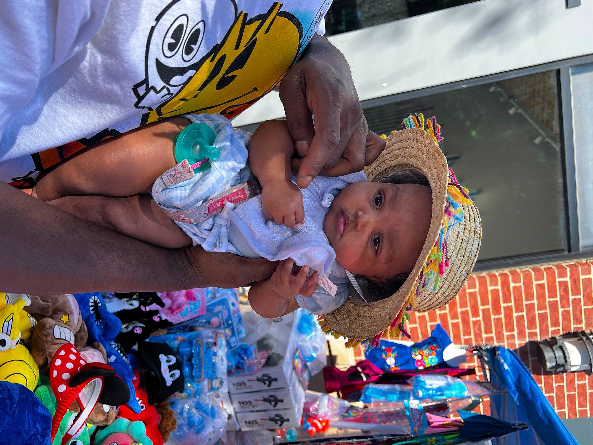 Alora joined the competition — help win amazing prizes! baby, child, event, festival, fun, happy, hat, headwear, leisure, party, person, plastic, plastic_bottle, play, public_event, shorts, street, t_shirt, toddler, vacation