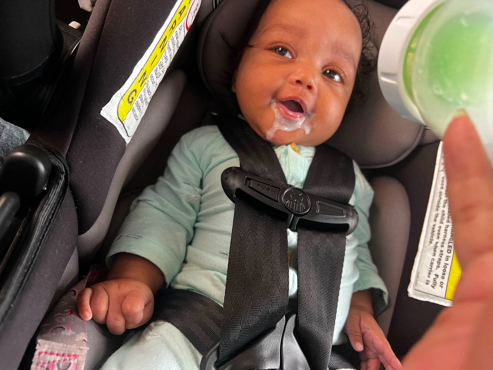 Alora joined the competition — help win amazing prizes! baby, baby_bottle, baby_in_car_seat, baby_products, baby_toddler_clothing, car, car_seat, comfort, drinkware, face, finger, happy, motor_vehicle, person, plastic_bottle, product, seat_belt, steering_wheel, tie, toddler
