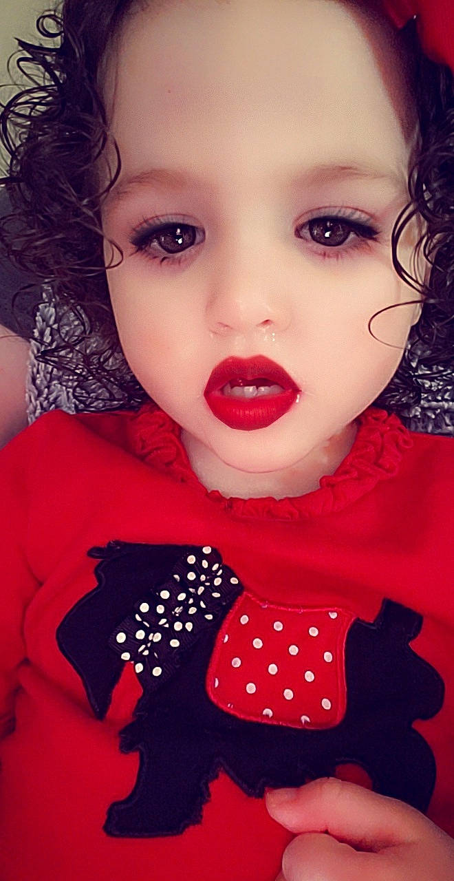 Layanna is registered to the contest to win money with this photo: beauty, black_hair, cheek, child, child_model, design, eye, eyebrow, face, hair, head, lip, mouth, nose, pattern, person, photography, polka_dot, red, skin