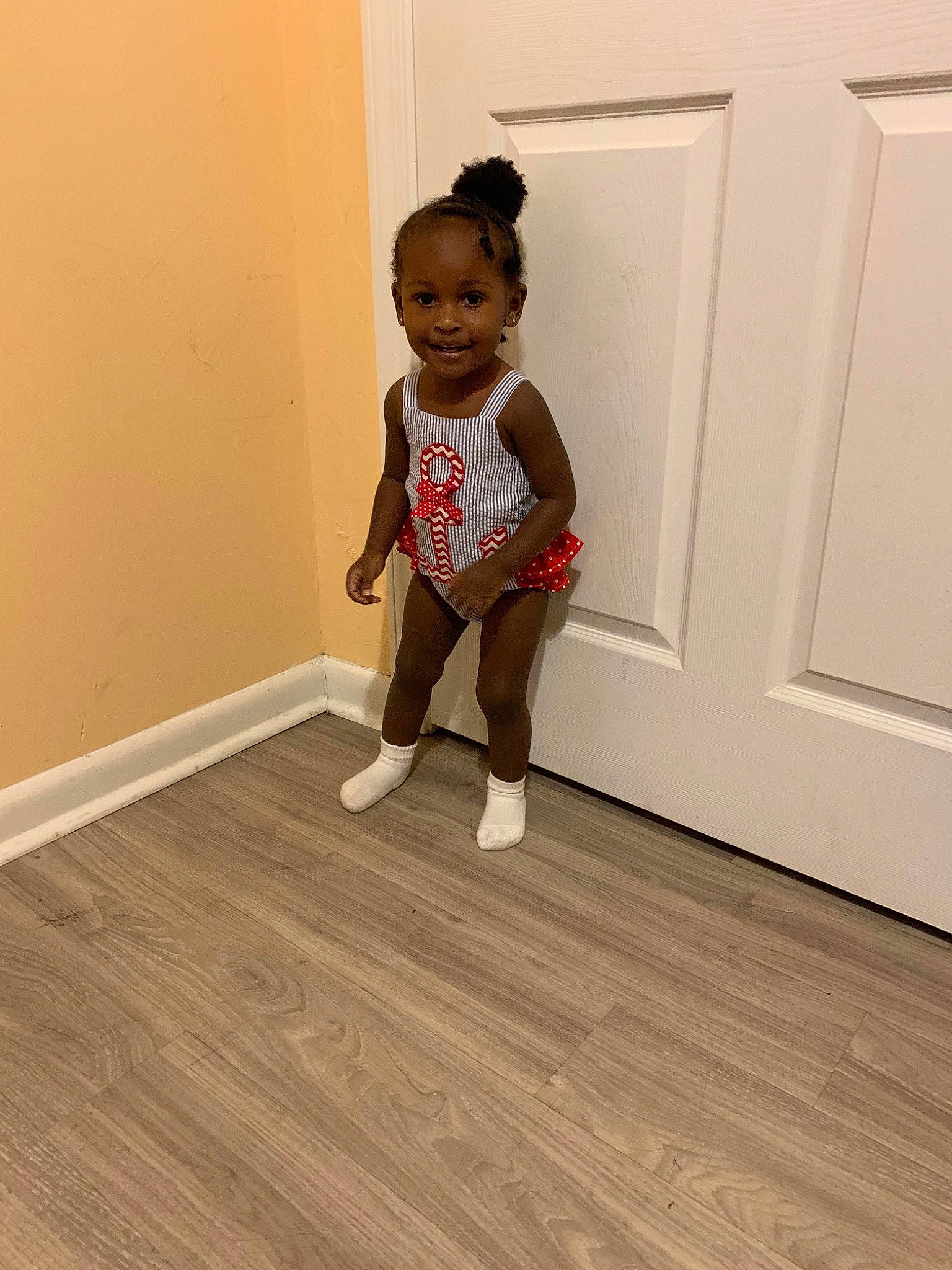 Kalani joined the competition — help win amazing prizes! child, floor, flooring, hardwood, laminate_flooring, leg, person, play, room, shoe, skin, standing, toddler, wood, wood_flooring