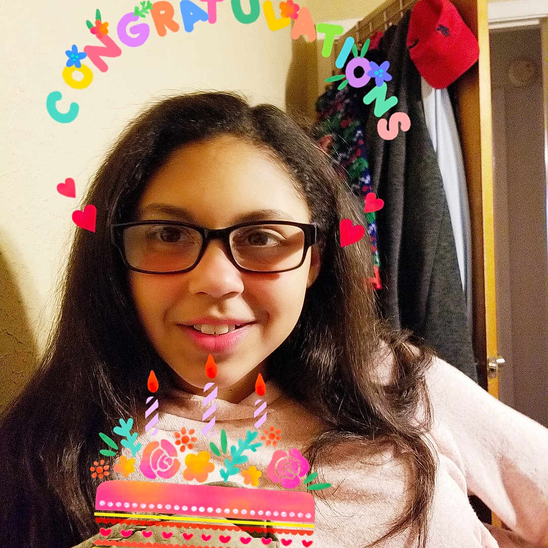 Jalynn is registered to the contest to win money with this photo: ear, eyewear, fashion_accessory, glasses, hair_coloring, happy, joy, long_hair, party, party_hat, person, pink, skin, smile, vision_care