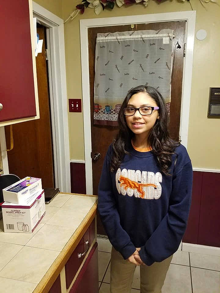 Jalynn is registered to the contest to win money with this photo: eyewear, glasses, house, interior_design, joy, long_hair, person, room, t_shirt, vision_care