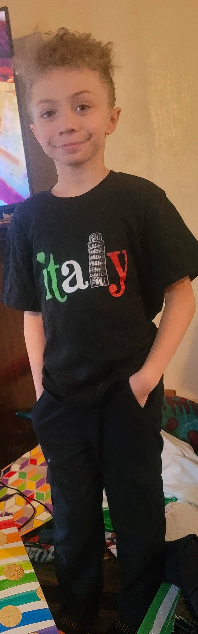 Colin is registered to the contest to win money with this photo: active_shirt, carmine, chest, elbow, electric_blue, eyewear, fashion_accessory, fashion_design, flesh, font, grey, joint, joy, magenta, neck, person, shoulder, sleeve, sportswear, t_shirt