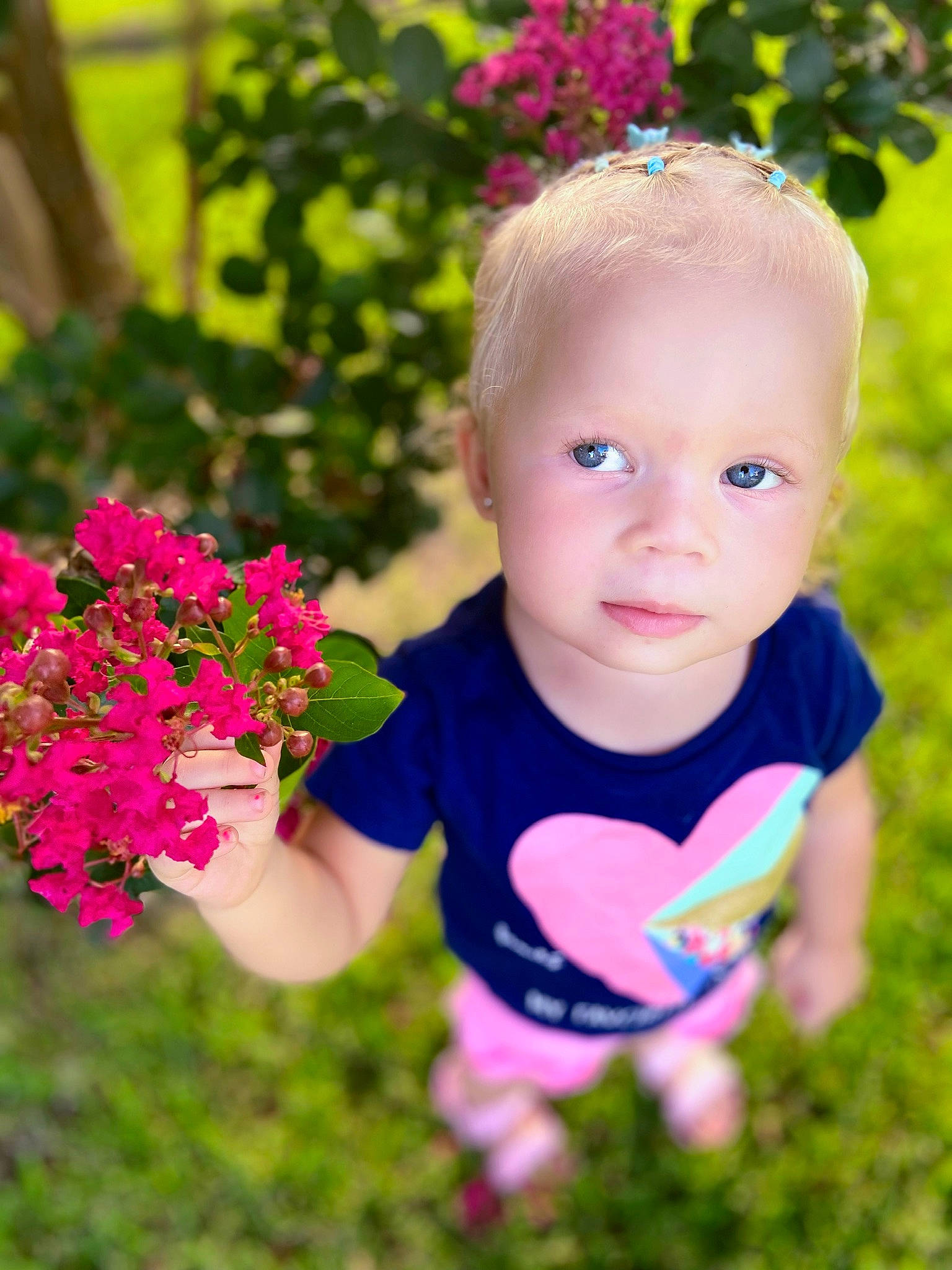 Amalie joined the competition — help win amazing prizes! baby, baby_toddler_clothing, beauty, flower, fun, grass, grass_family, green, happy, leaf, leisure, magenta, meadow, people_in_nature, person, petal, pink, plant, skin, t_shirt