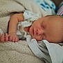 Leland Matthew joined the competition — help win amazing prizes! baby, newborn, sleeping, infant, blanket, bedding, hand, face, portrait, closeup, cozy, nursery, soft_texture, peaceful, swaddle, cheek, pillow, skin, newborn_clothing, resting