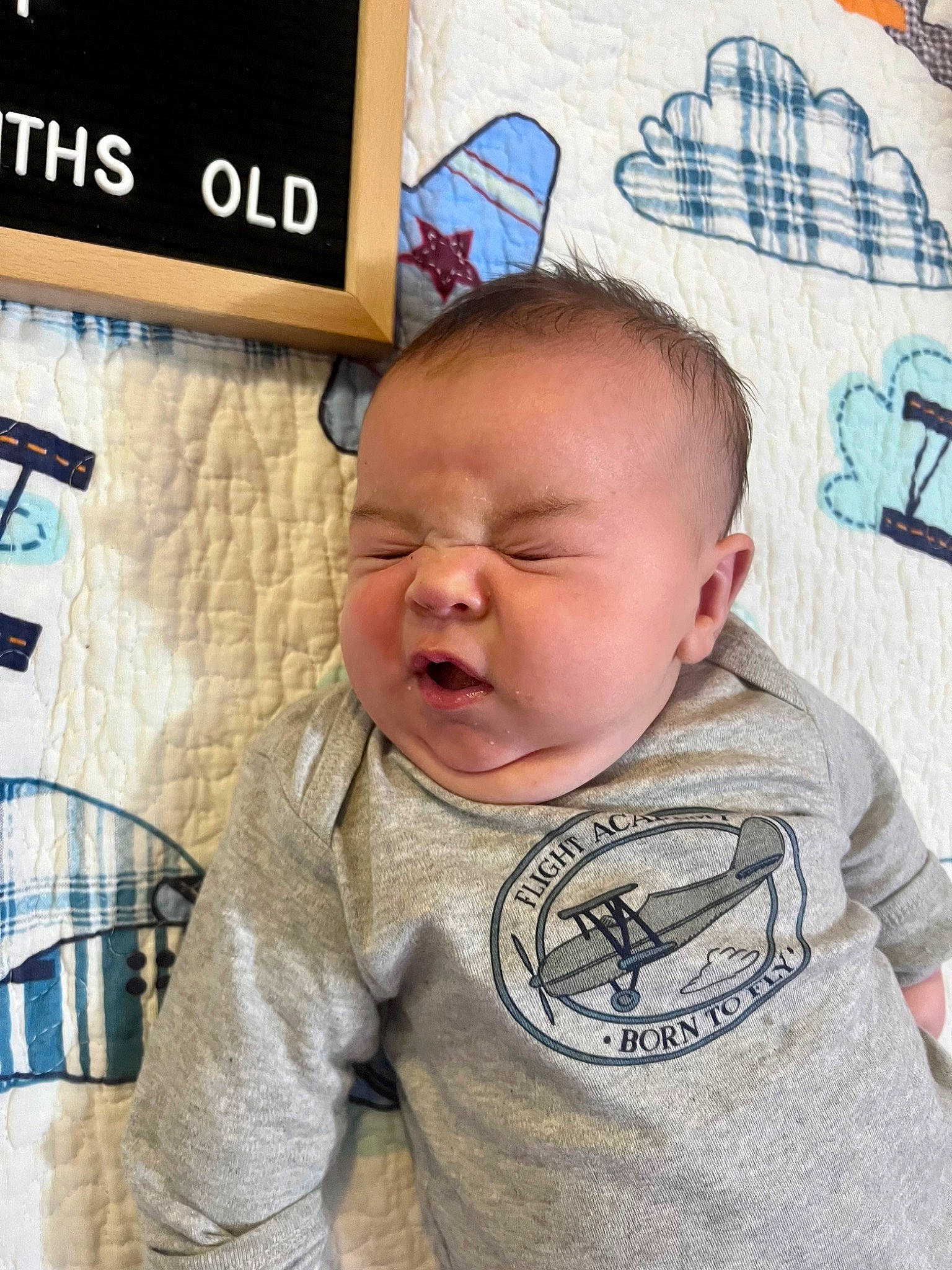 Koen is registered to the contest to win money with this photo: baby, baby_toddler_clothing, blue, cheek, chin, comfort, cool, face, facial_expression, hairstyle, happy, human, mammal, mouth, nose, person, product, skin, sleeve, t_shirt