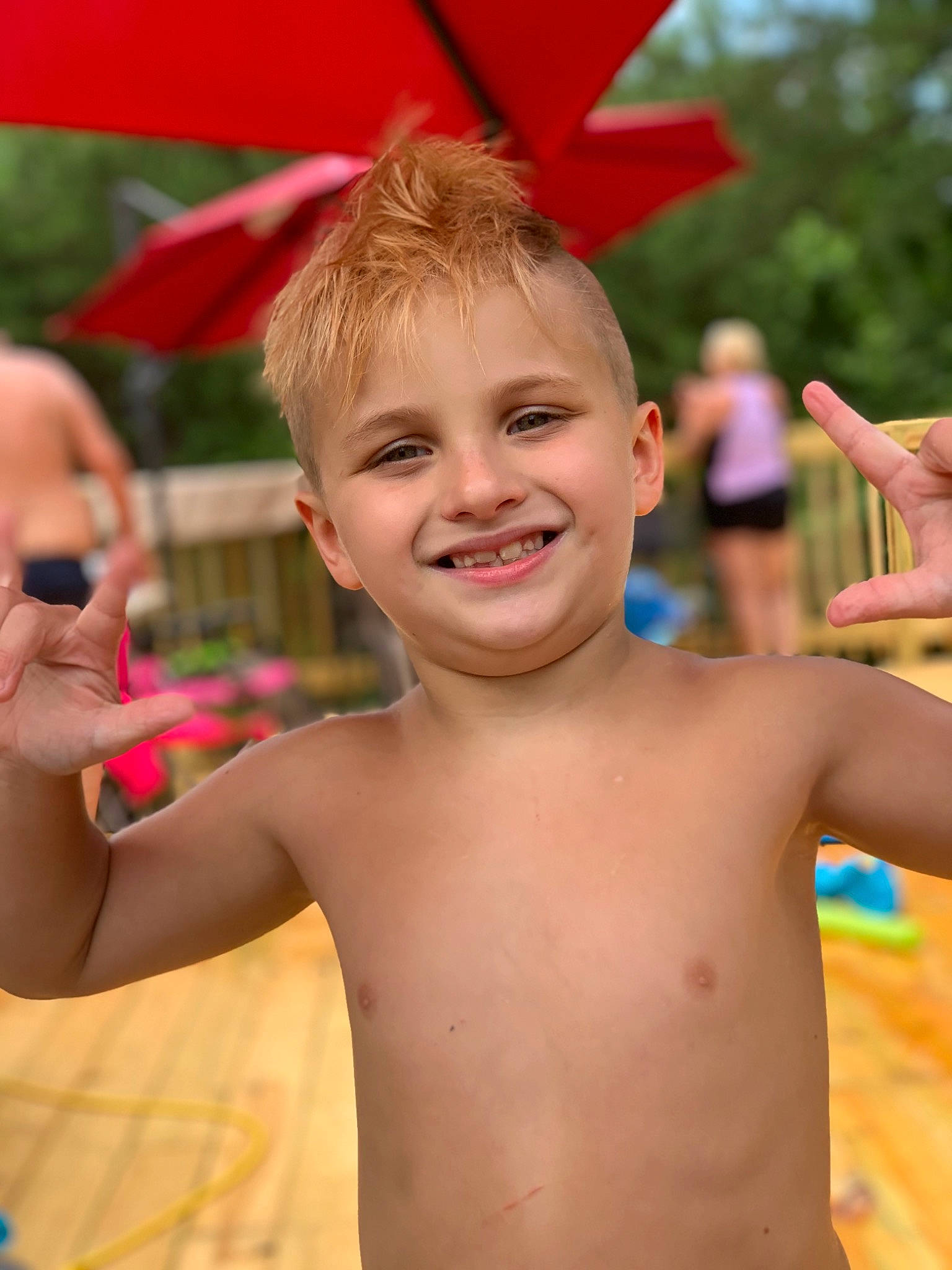 Conner joined the competition — help win amazing prizes! barechested, chest, child, facial_expression, finger, fun, gesture, hand, happy, joy, leisure, muscle, neck, person, play, recreation, smile, summer, thumb, vacation