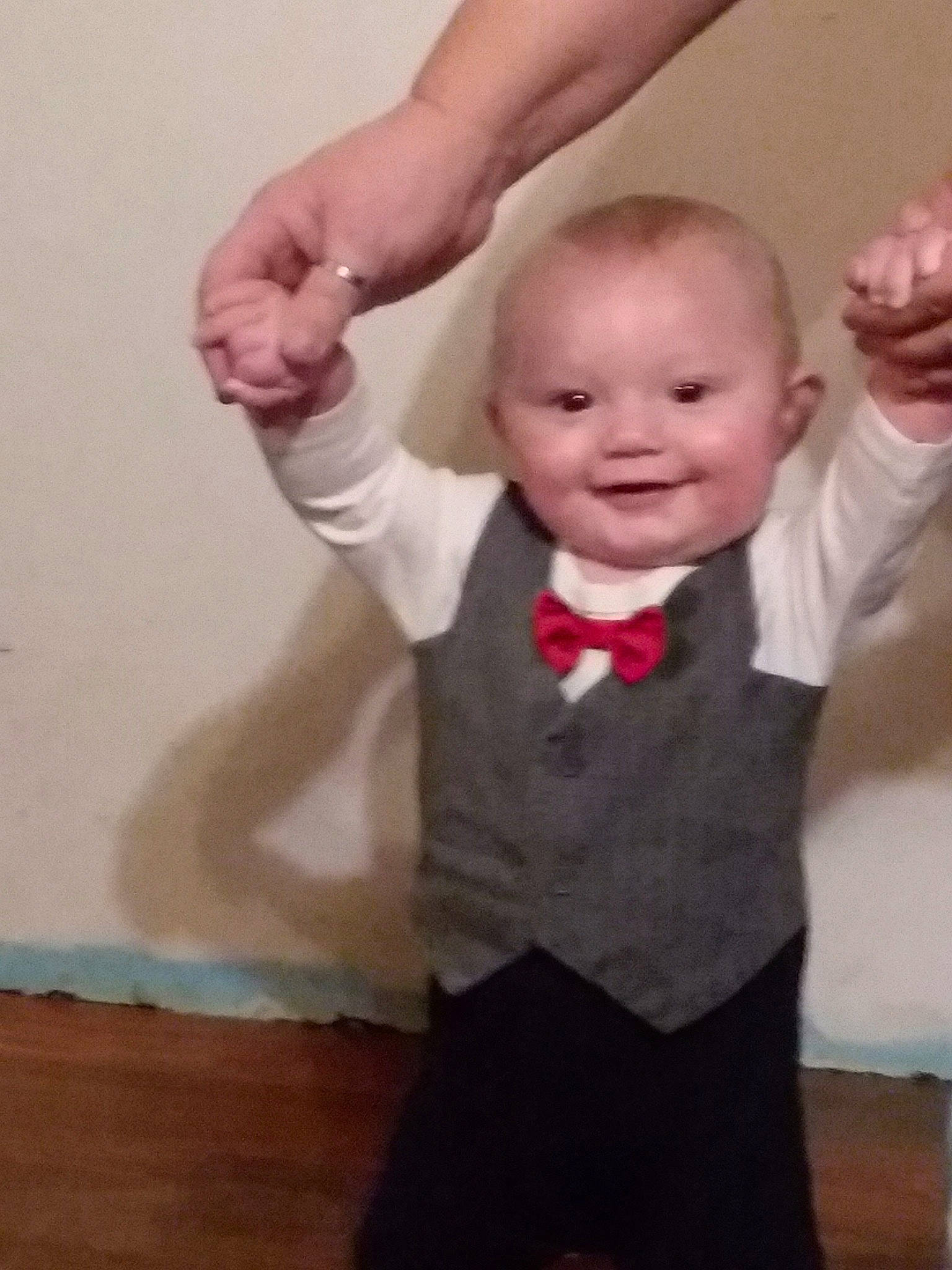 Kye joined the competition — help win amazing prizes! arm, baby, cheek, child, facial_expression, finger, formal_wear, gesture, hand, head, joint, joy, leg, muscle, neck, person, smile, standing, suit, thumb