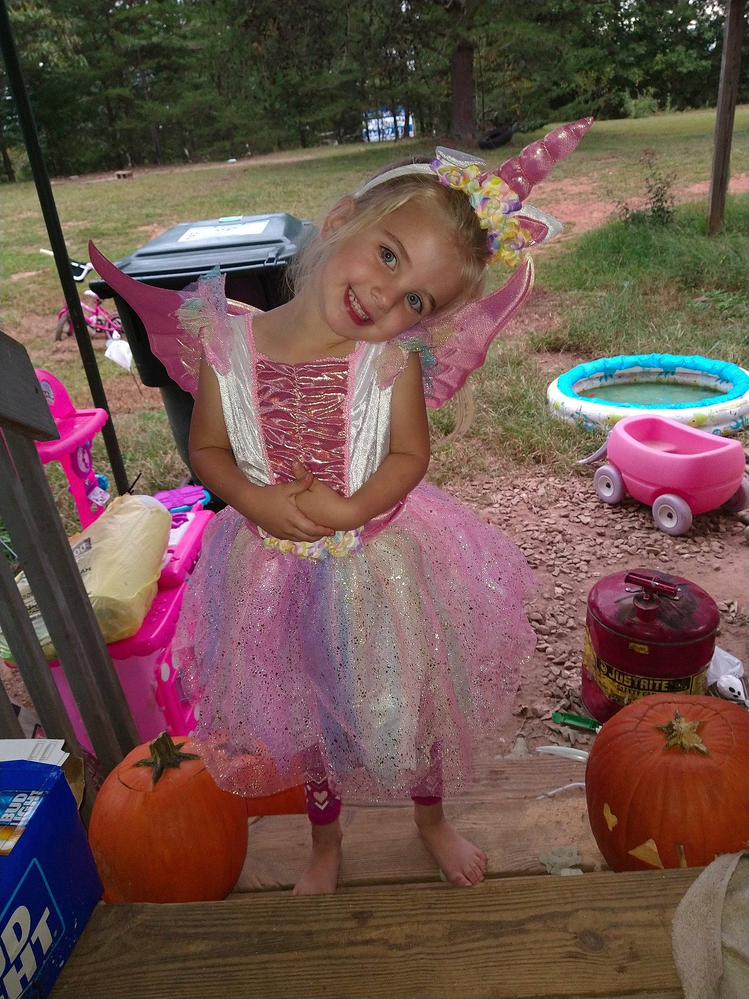 Gracie joined the competition — help win amazing prizes! calabaza, child, cucurbita, event, facial_expression, fun, gourd, grass, happy, joy, leisure, magenta, person, pink, plant, pumpkin, recreation, smile, toddler, tree