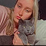 Mistigri participe au concours pour gagner de l'argent avec cette photo : abyssinian, adult, animal, blonde, bodypart, cat, cosmetics, face, female, finger, hair, head, indoors, kitten, lipstick, person, pet, photography, portrait, woman