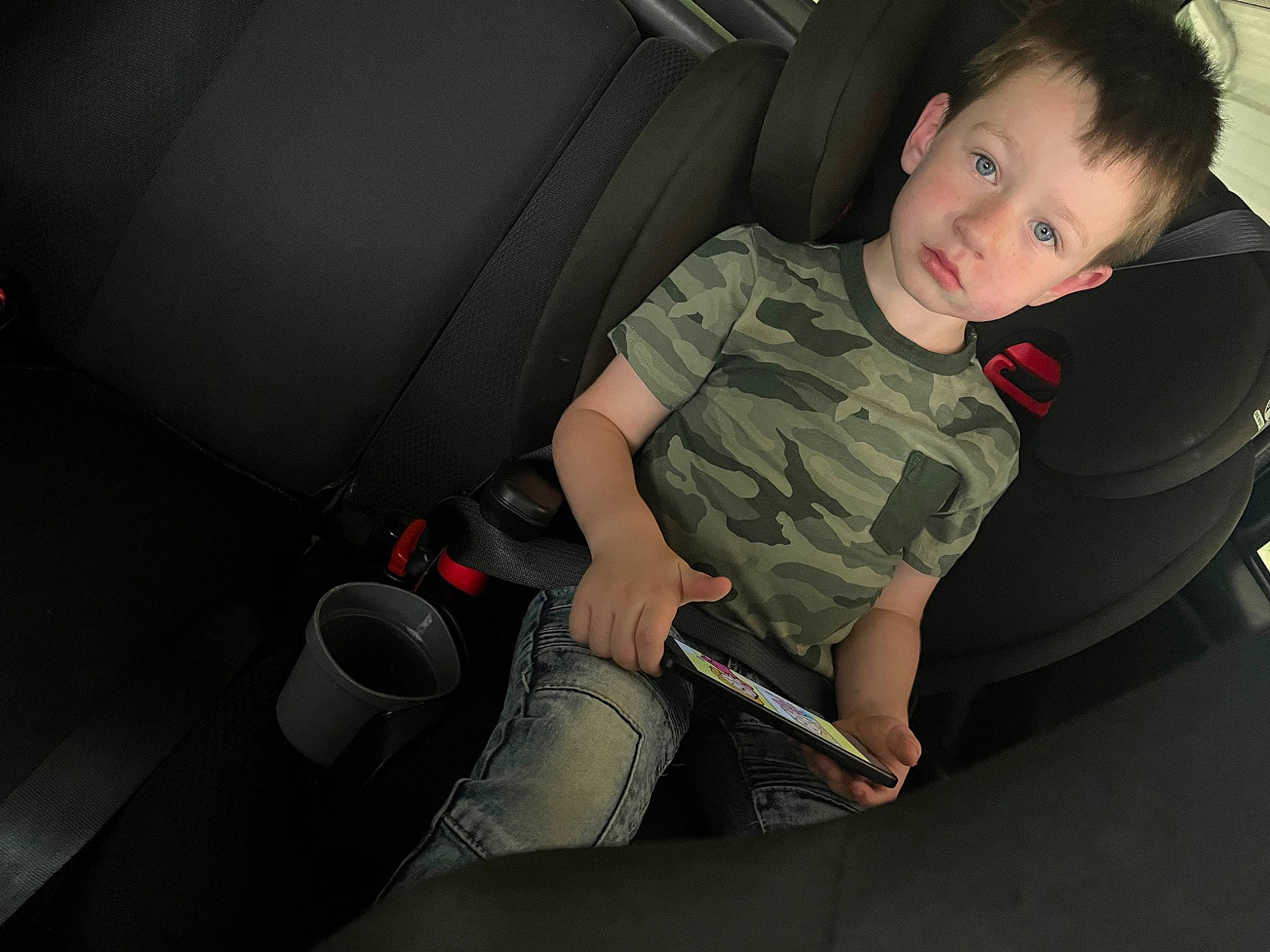 Phillip is registered to the contest to win money with this photo: auto_part, automotive_design, automotive_exterior, automotive_tire, automotive_wheel_system, car_seat, car_seat_cover, comfort, family_car, flash_photography, hand, head_restraint, human_leg, joint, knee, motor_vehicle, person, thigh, tints_and_shades, toddler