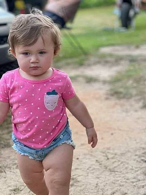 Lydia joined the competition — help win amazing prizes! barefoot, body_of_water, child, fun, gesture, grass, happy, human_leg, leisure, people_in_nature, person, pink, recreation, shoulder, sleeve, thigh, toddler, trunk, vertebrate, waist