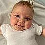 Alfie joined the competition — help win amazing prizes! baby, cheeks, child, closeup, cute, eyes, face, hair, happy, head, infant, lying_down, newborn, onesie, person, portrait, skin, smiling, soft_background, white_clothing