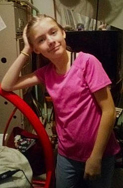 Kaylee is registered to the contest to win money with this photo: arm, chair, chest, elbow, fun, happy, human_leg, jaw, joint, joy, magenta, person, selfie, shoulder, sleeve, smile, sportswear, t_shirt, thigh, thumb