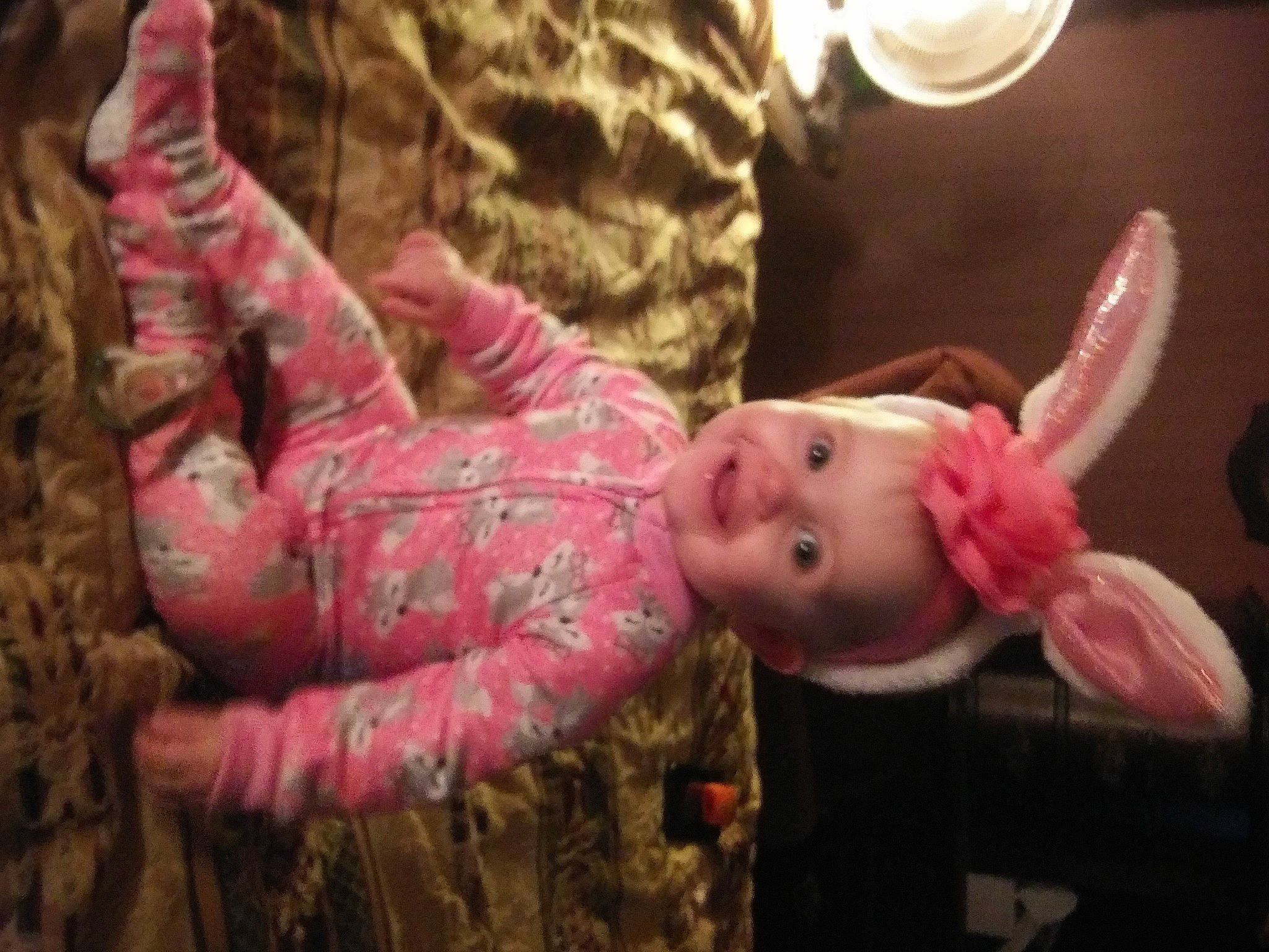 Lilly Grace is registered to the contest to win money with this photo: baby, baby_toddler_clothing, cheek, child, event, flesh, fun, fur, grass, joy, military_camouflage, organism, person, pink, room, skin, sleeve, toddler, toy, wood