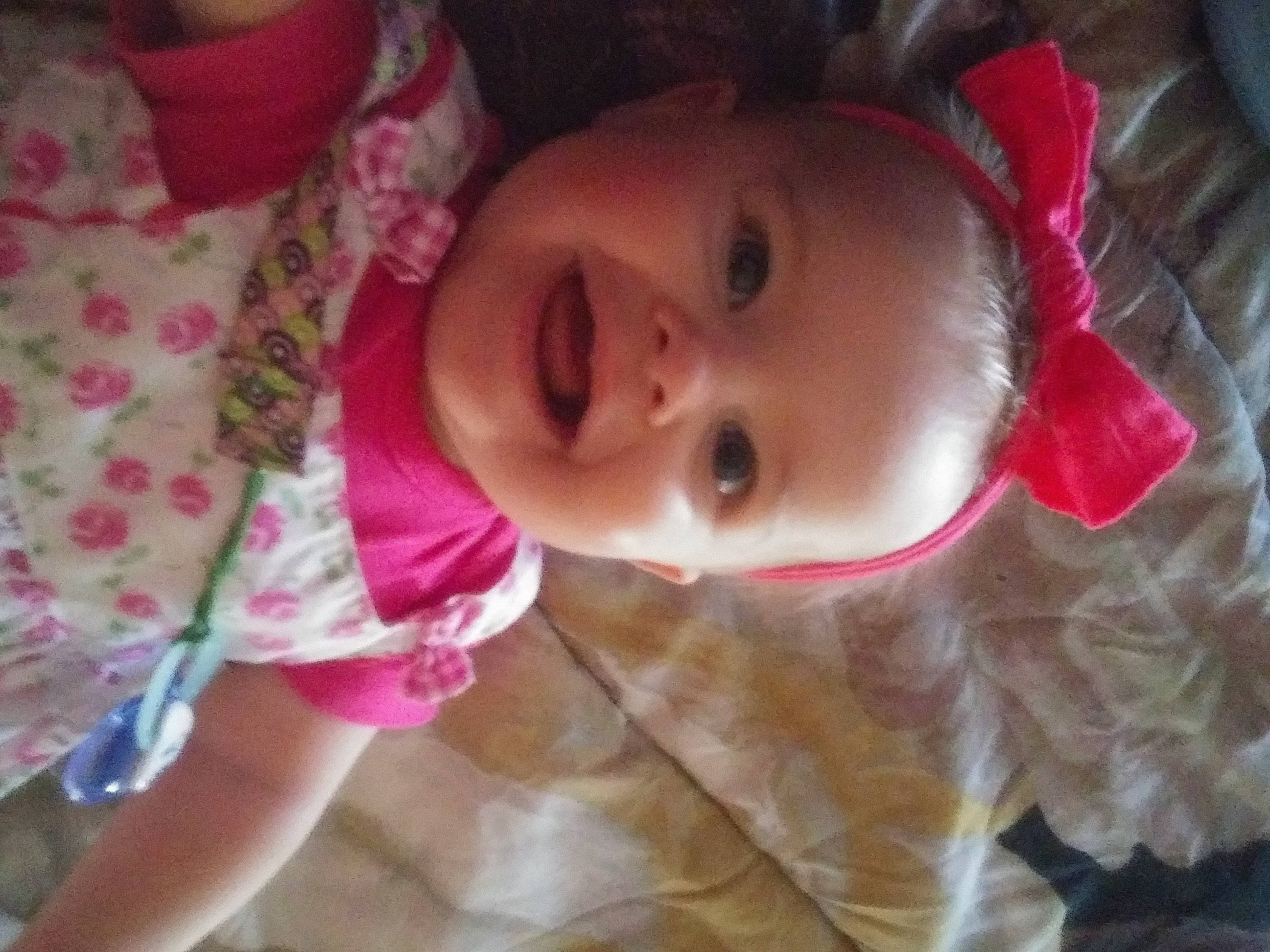 Lilly Grace is registered to the contest to win money with this photo: baby_toddler_clothing, cheek, chin, ear, eye, eyebrow, eyelash, face, hair, hairstyle, head, human_body, iris, lip, mouth, neck, nose, person, pink, skin