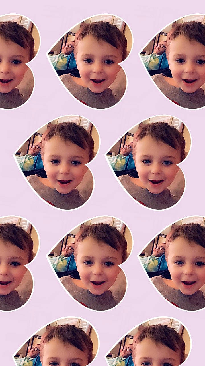 Dom is registered to the contest to win money with this photo: cheek, child, chin, clothing, eye, eyebrow, face, facial_expression, hair, hairstyle, happy, head, human, joy, neck, nose, organ, outerwear, person, photograph