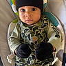Aero joined the competition — help win amazing prizes! baby, infant, child, hat, mittens, overalls, camo, car_seat, clothing, face, eyes, fist, knit_hat, seated, apparel, cute, young, portrait, expression, indoor